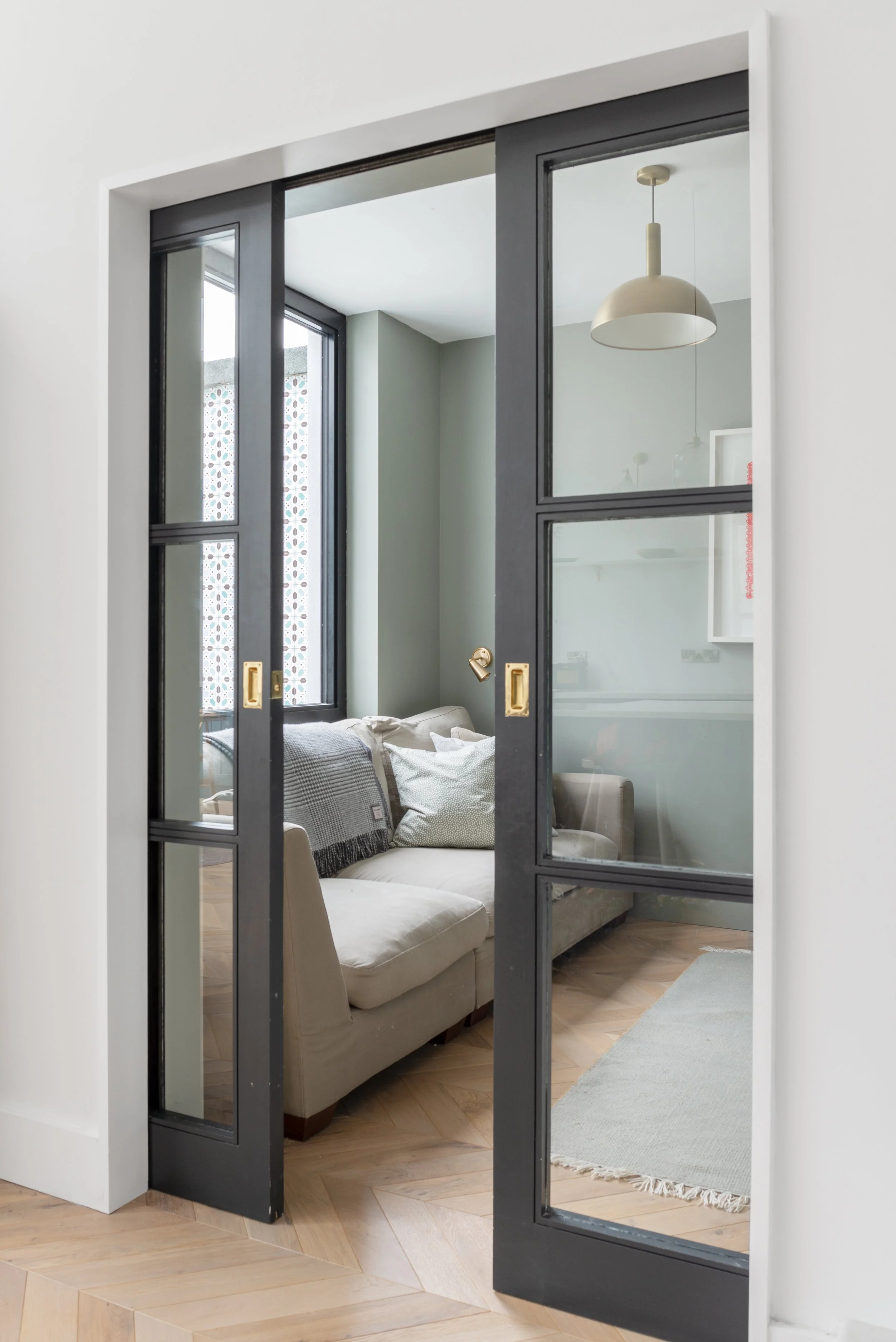 sliding doors into living room snug