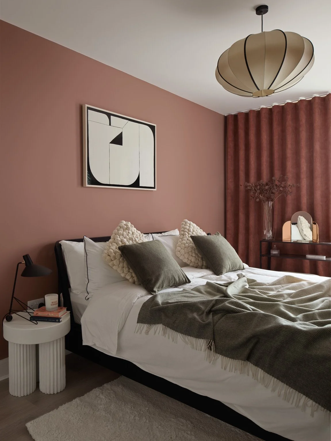red double bedroom with red drapes
