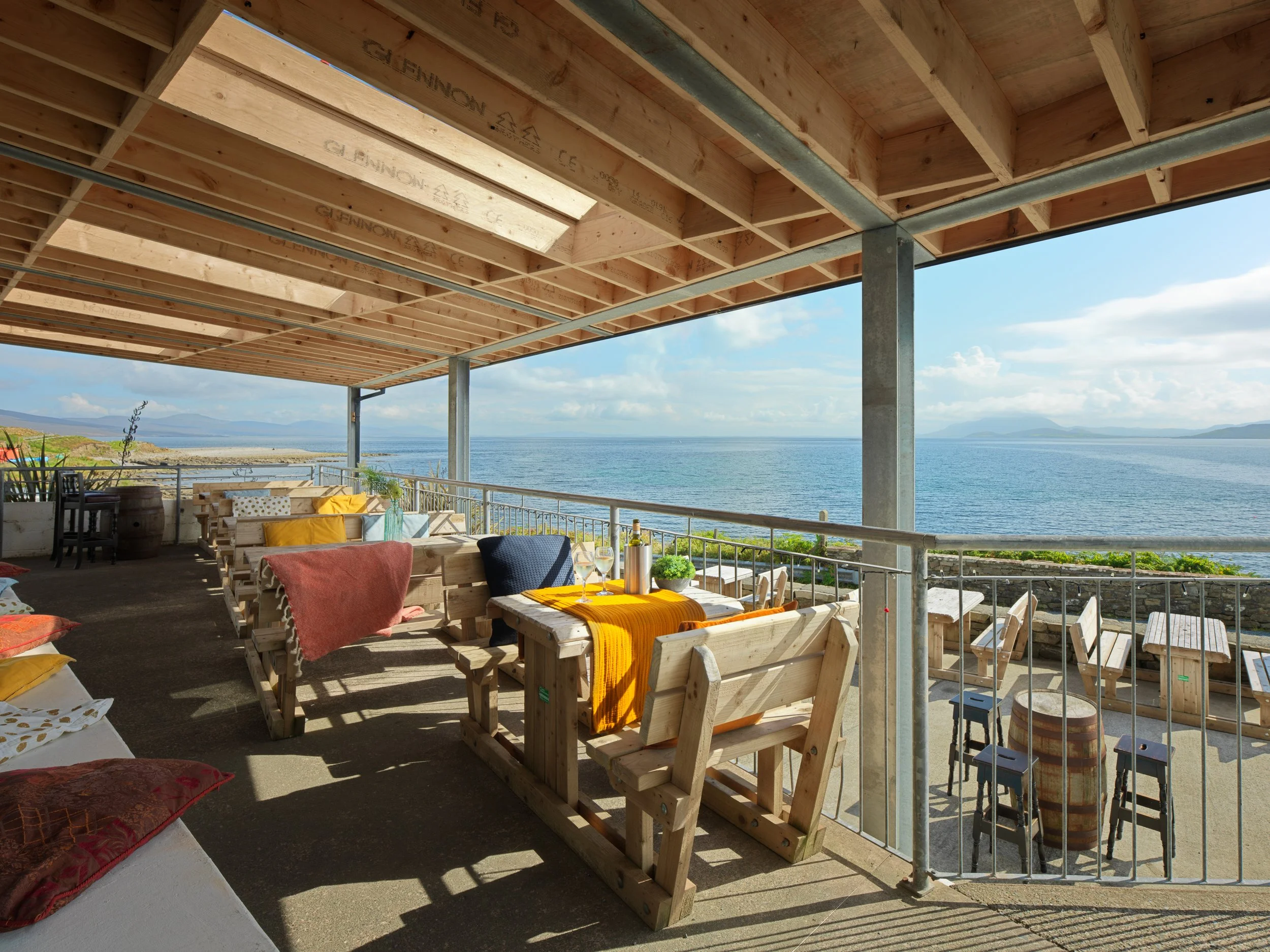 outdoor dining area with sea view looking toward Crouch Patrick