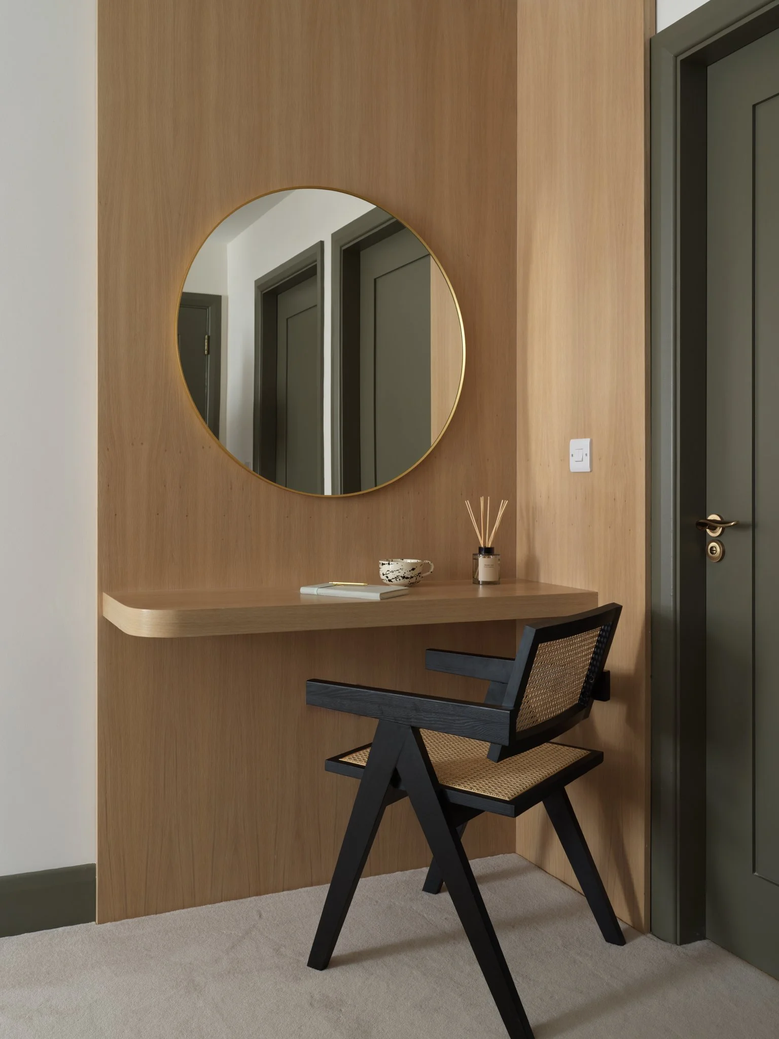 oak bedroom vanity unit with contemporary black & rattan chair