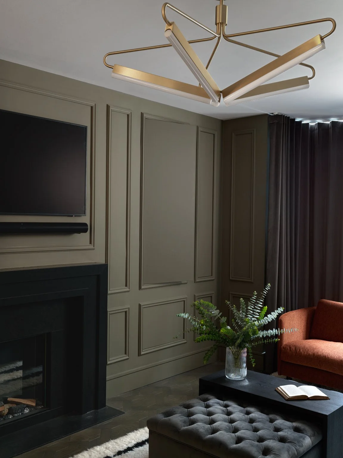 sage green interior design living room hidden storage