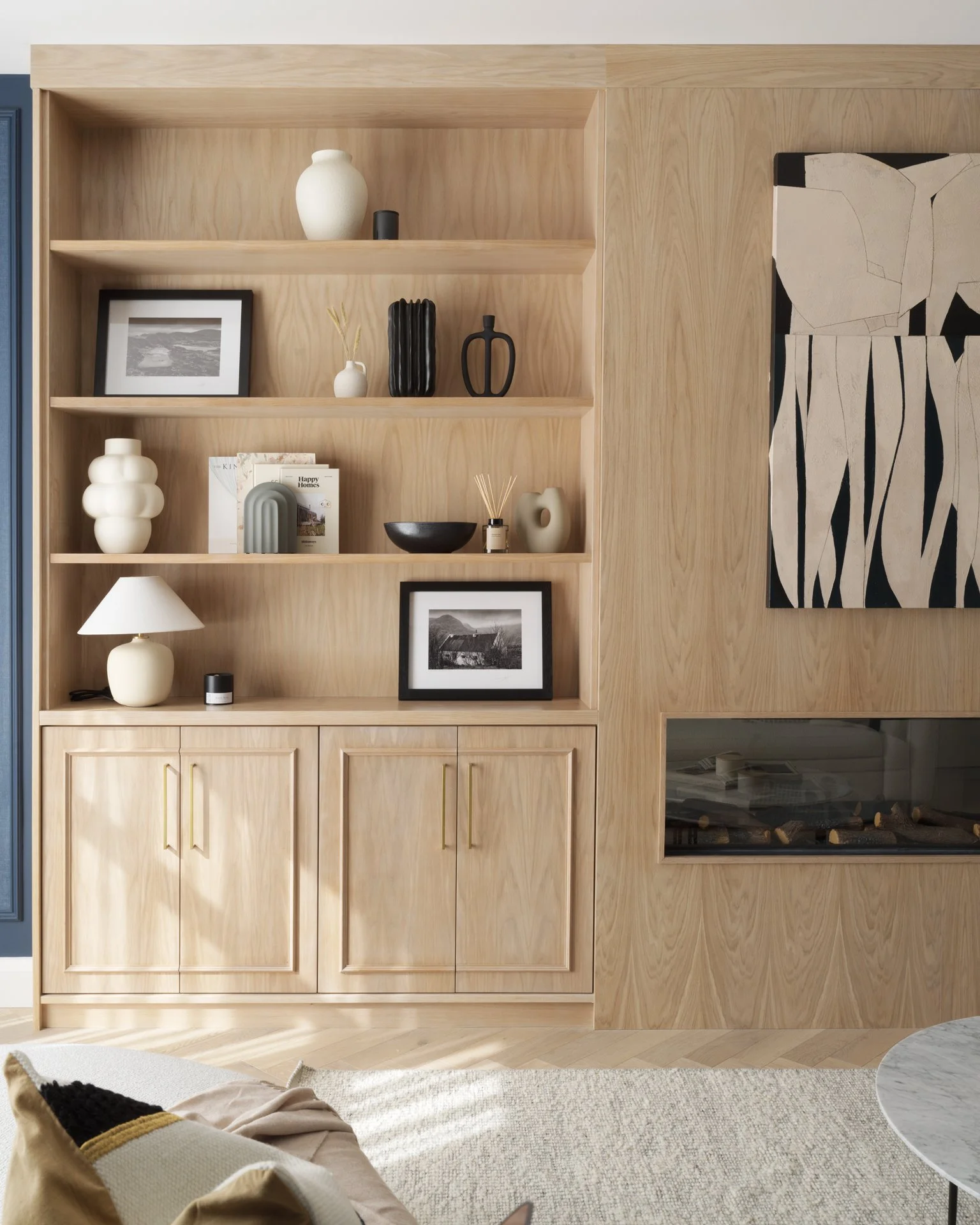 oak cabinetry with integrated electric fire & cream rug