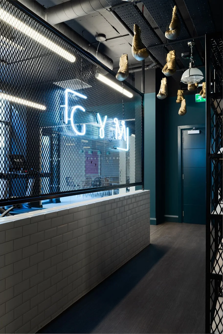 gym entrance with neon gym sign