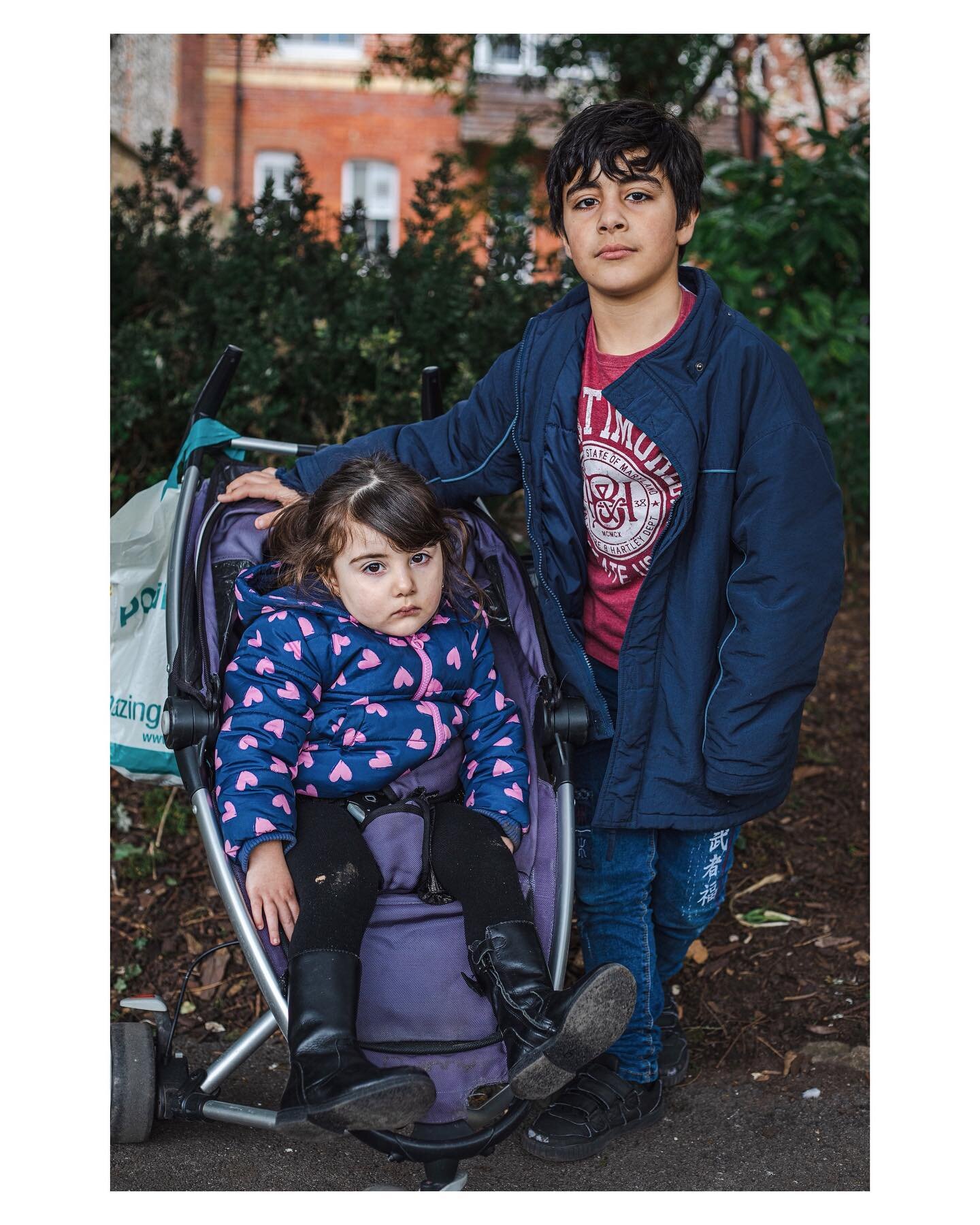 ParkLife 2020 
I met this family during my daily park strolls during lockdown. Their mother was reluctant to be part of the picture. I love the little girls facial expression, she&rsquo;s like a doll.
.
.
.
.
.
.
#parklife #winchesterstreetphotograph