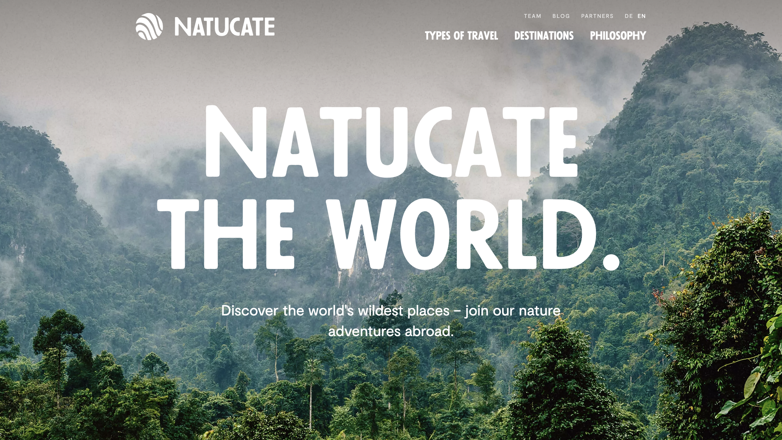 Misty forest landscape with bold white text reading “NATUCATE THE WORLD,” promoting eco-travel and adventure tours.