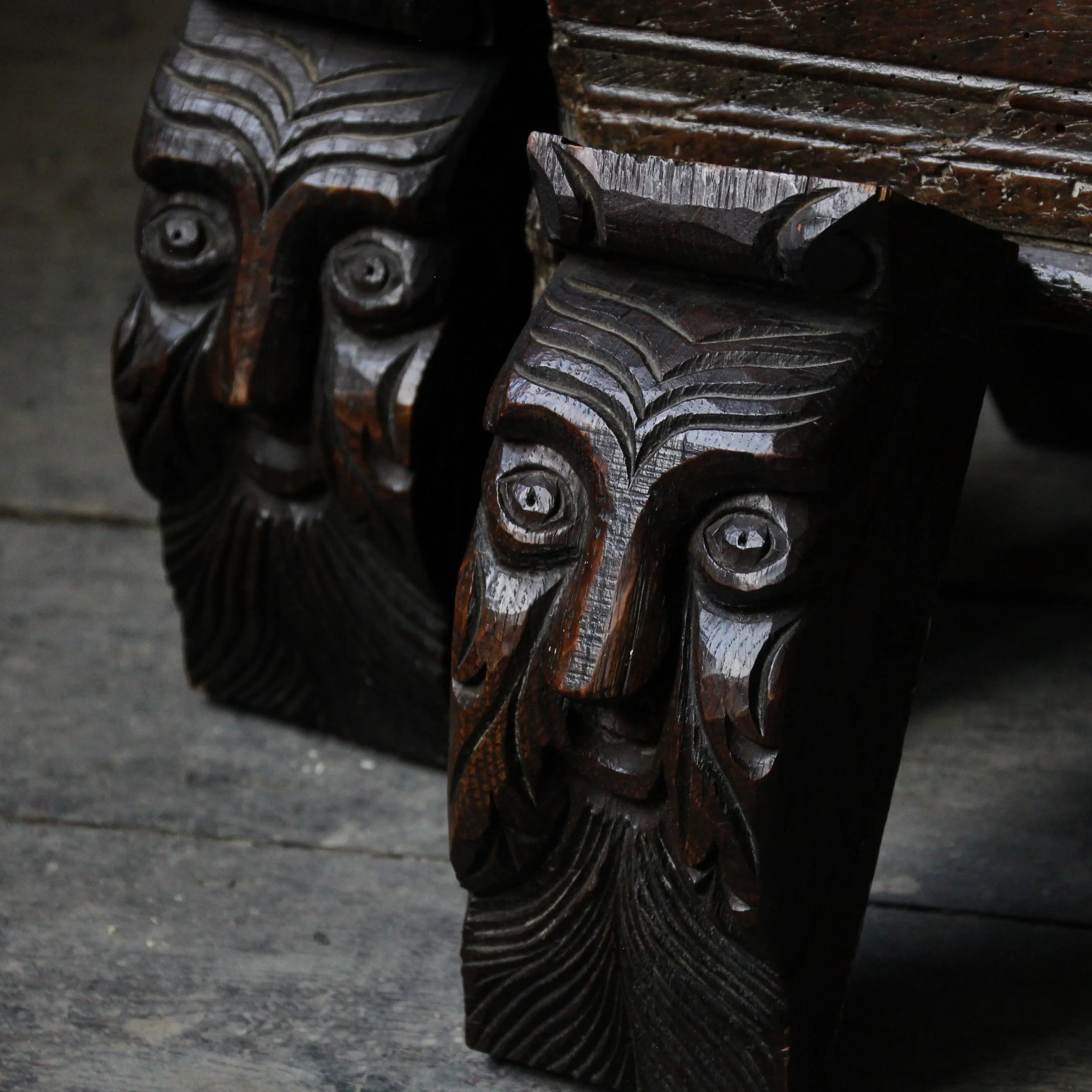 Pair of 19th century carved oak green man corbels, folk art