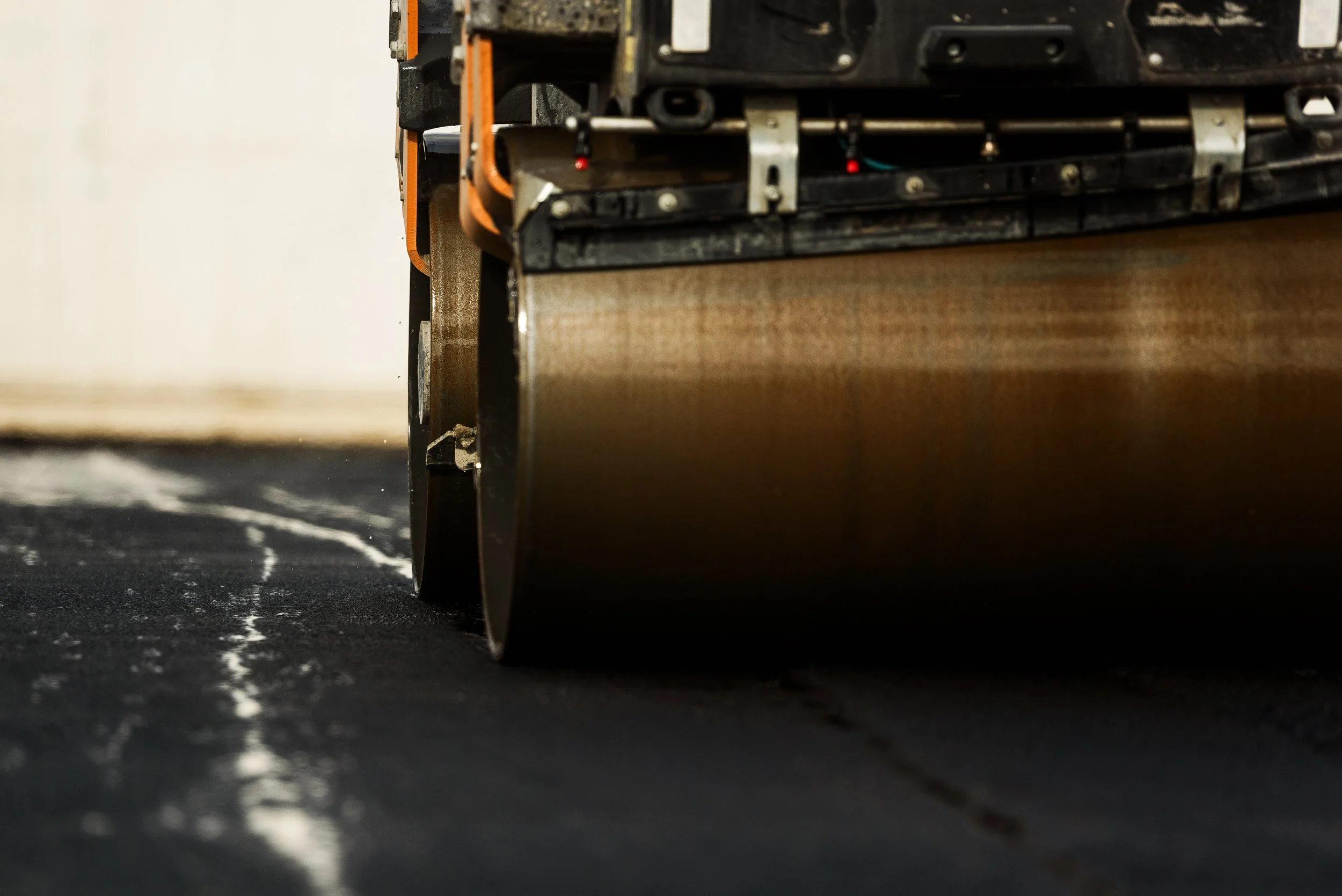 Roller going over fresh asphalt