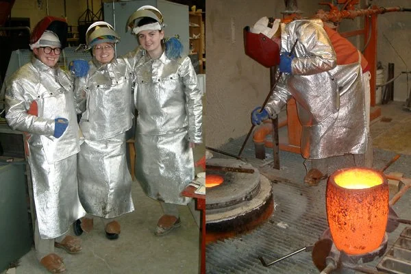 The pour team on this day was Line, Teri, and Sam, at the Millersville University sculpture foundery. In preparation to the pour, Line attends the molten bronze skimming off the skum and with help, lift the crucible from the furnace. Hot, heavy, hard