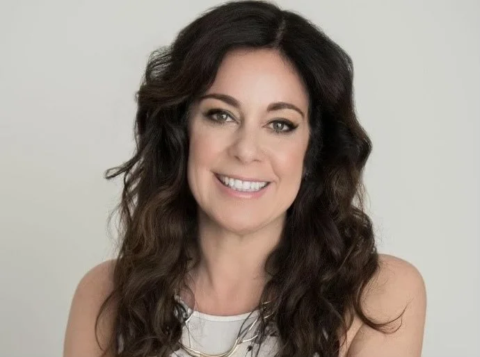 The Road to Economic Independence Begins with Confidence in Her Suit