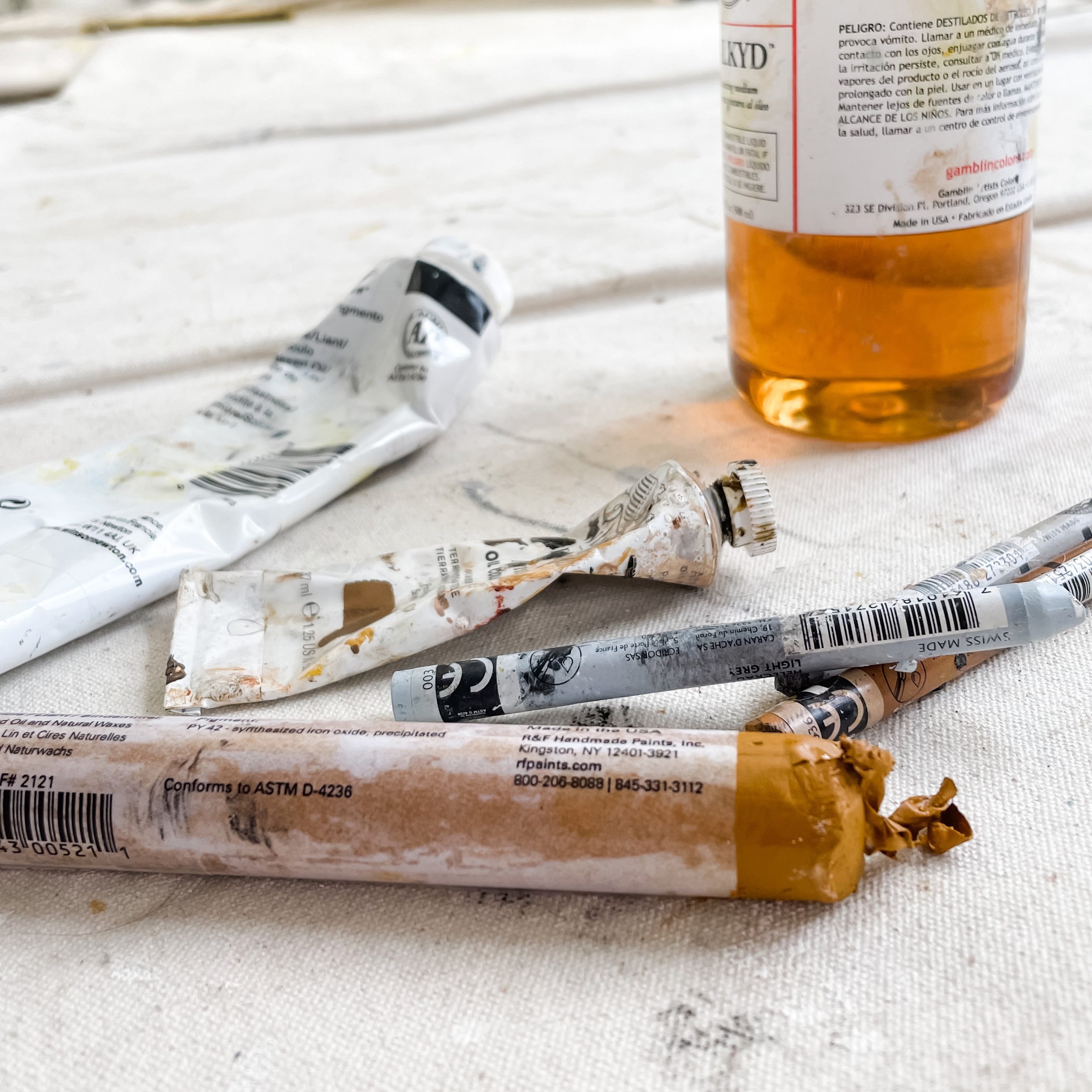 oil painting materials on canvas in the light filled studio of Chris Brandell