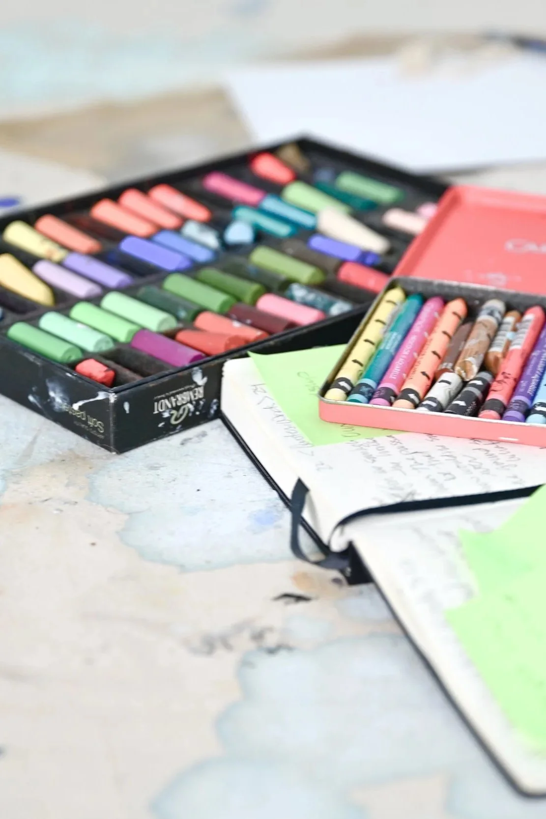 art materials and the journal of Chris Brandell in her light filled studio on Marco island