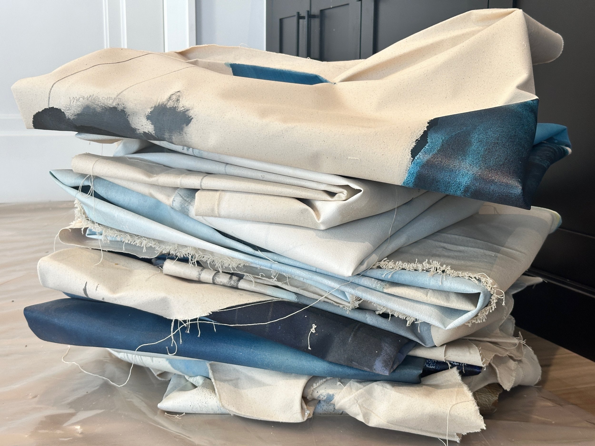 lose canvases for the trash pile in the studio of abstract artist, Chris Brandell