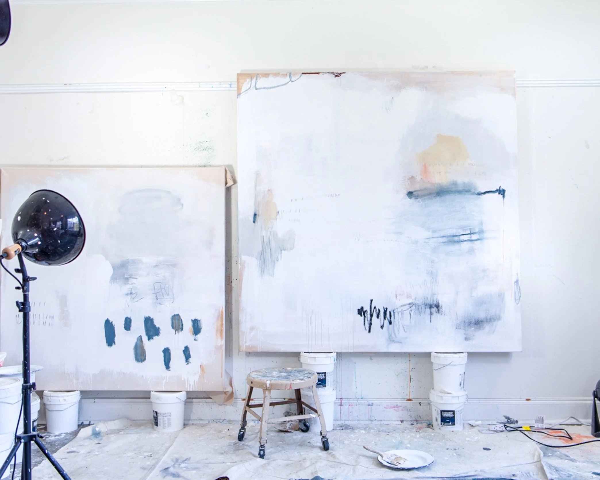 two paintings in progress in abstract artist Chris Brandell's VA studio