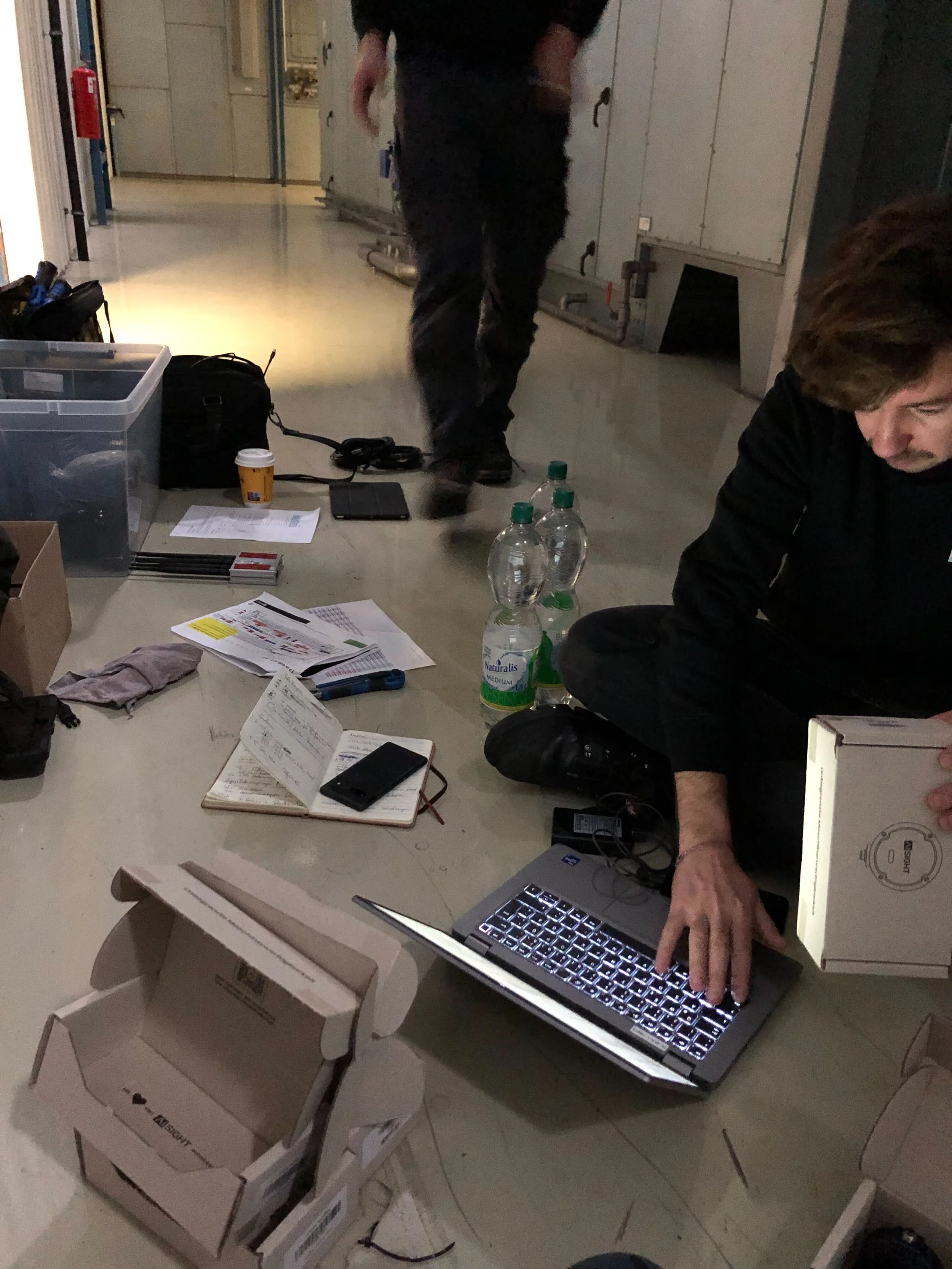 Photo of the team unboxing sensors