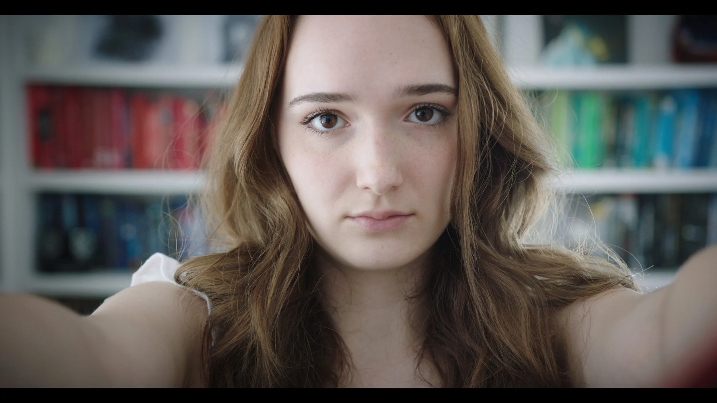 Ash reluctantly sets up for an update to her social media feed