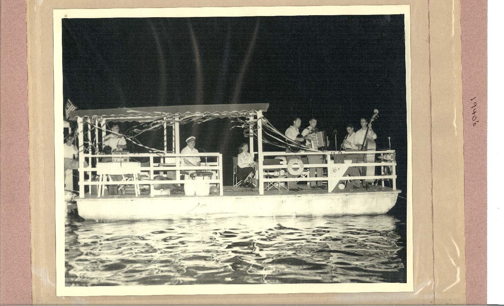 Photo "1940's" shows band on barge