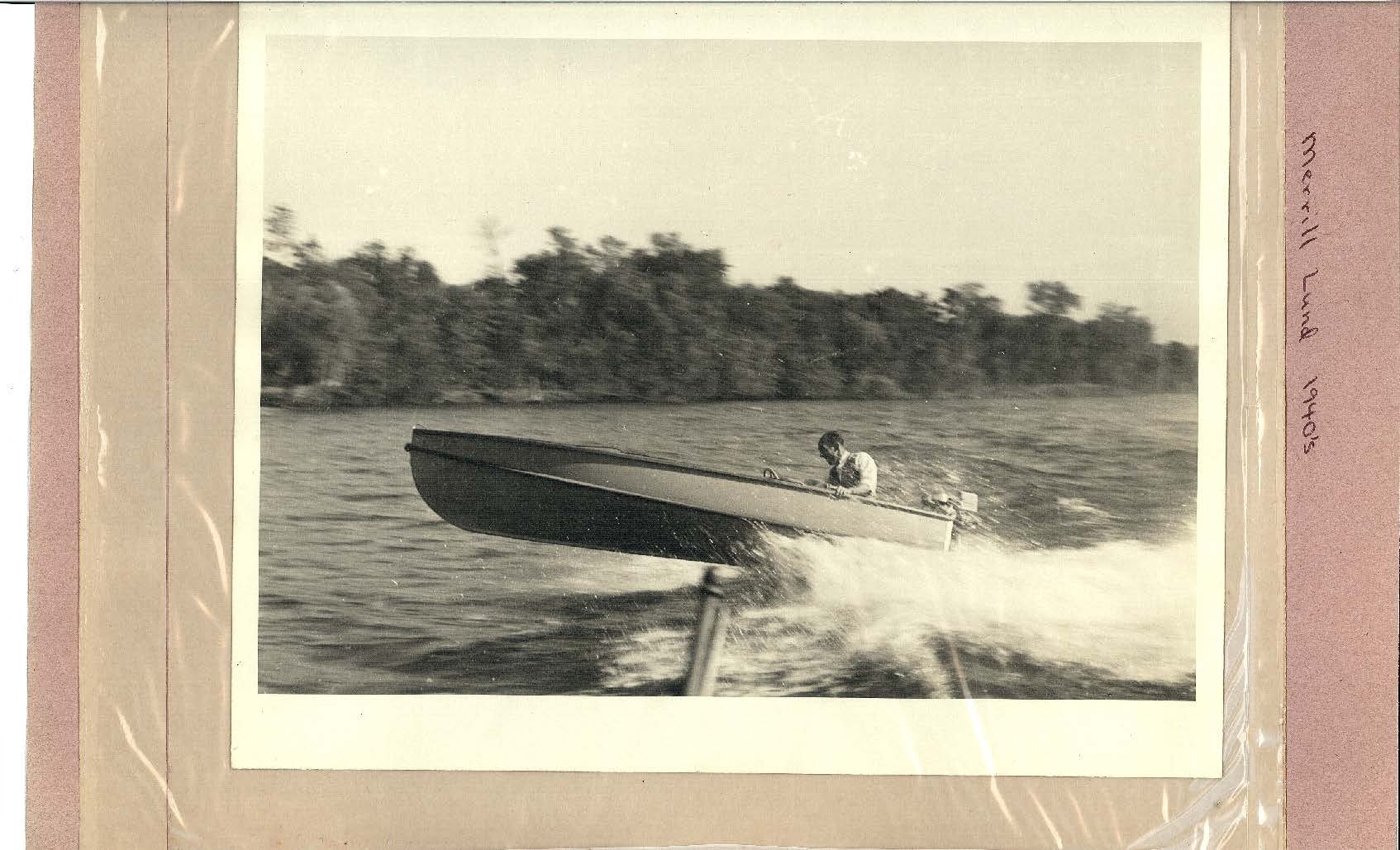 Photo "Merrill Lund 1940's" shows small race boat