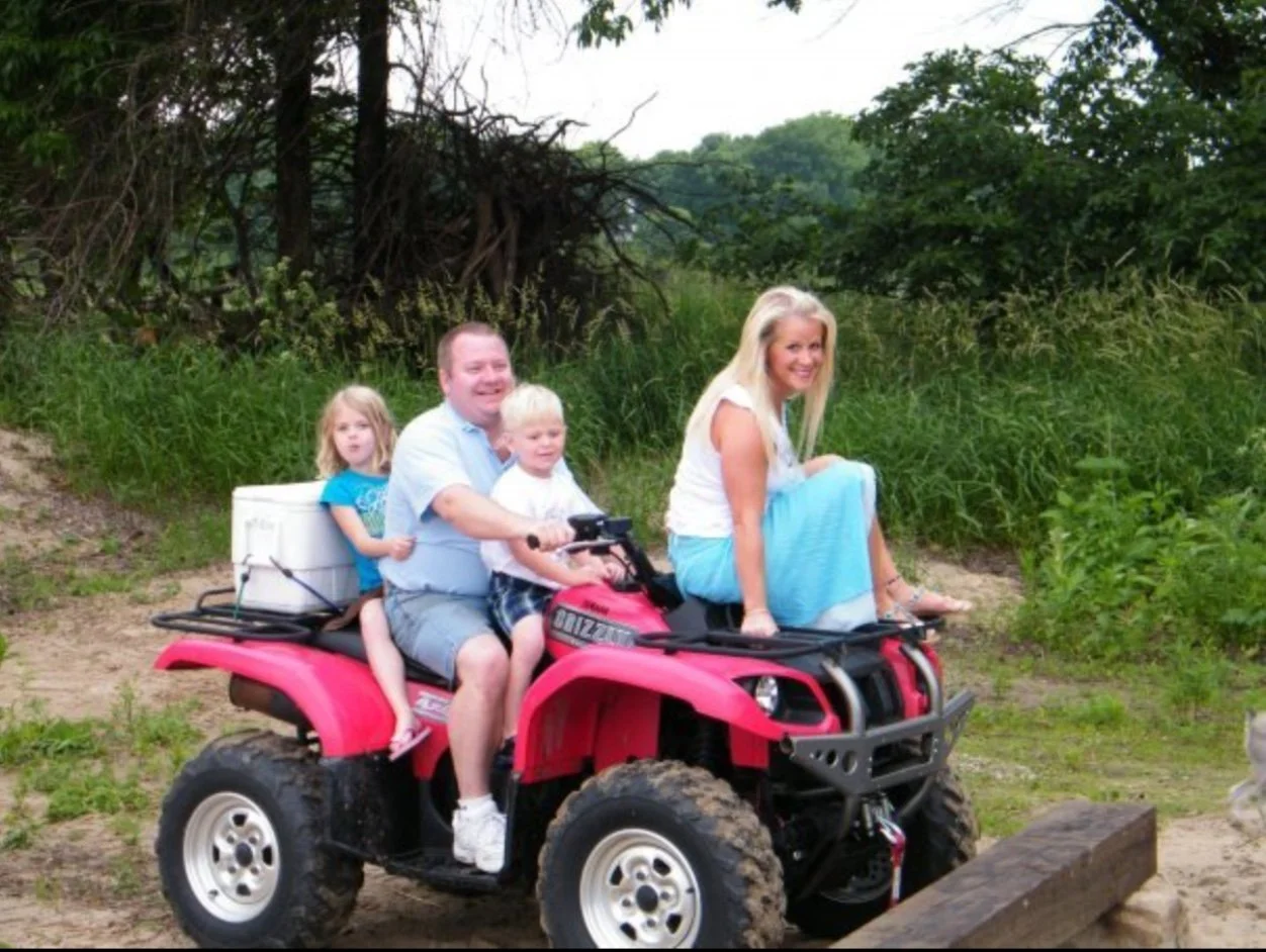 2009-06-18 photo Kaas family on quad.jpeg