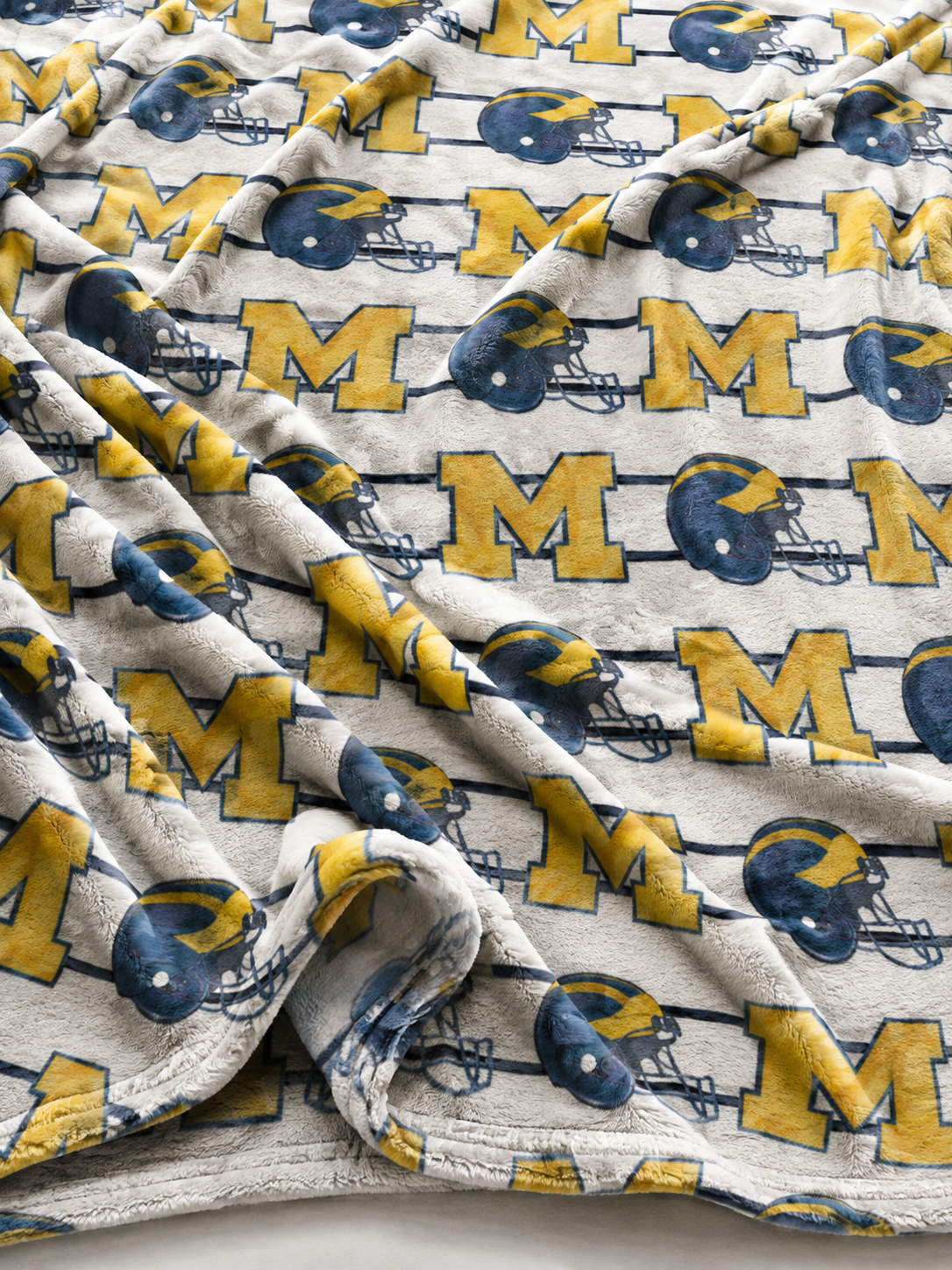 Abigail Leigh Designs U of M Football Helmet Blanket close-up.png