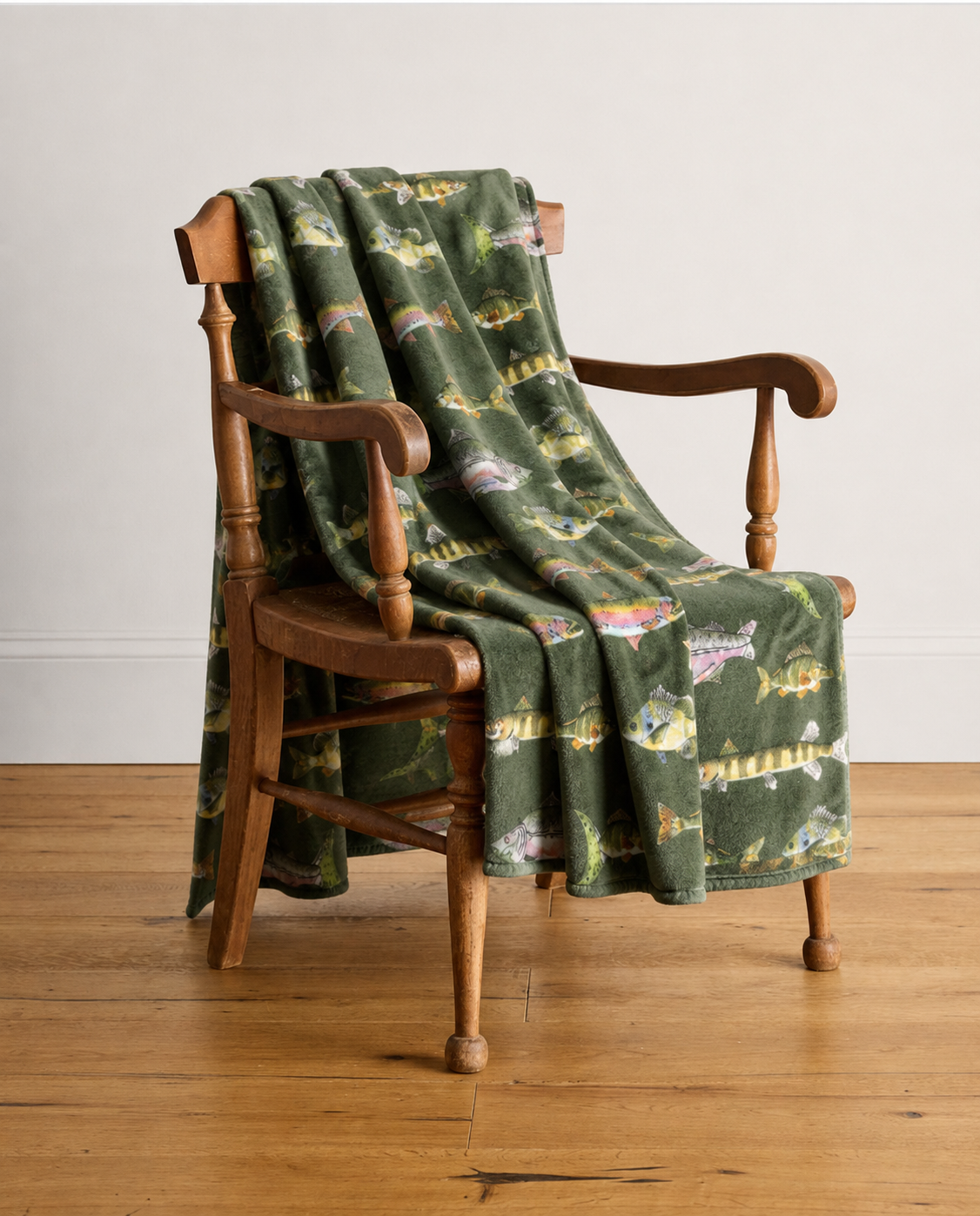 Abigail Leigh Designs Fish of Michigan Blanket on chair.png