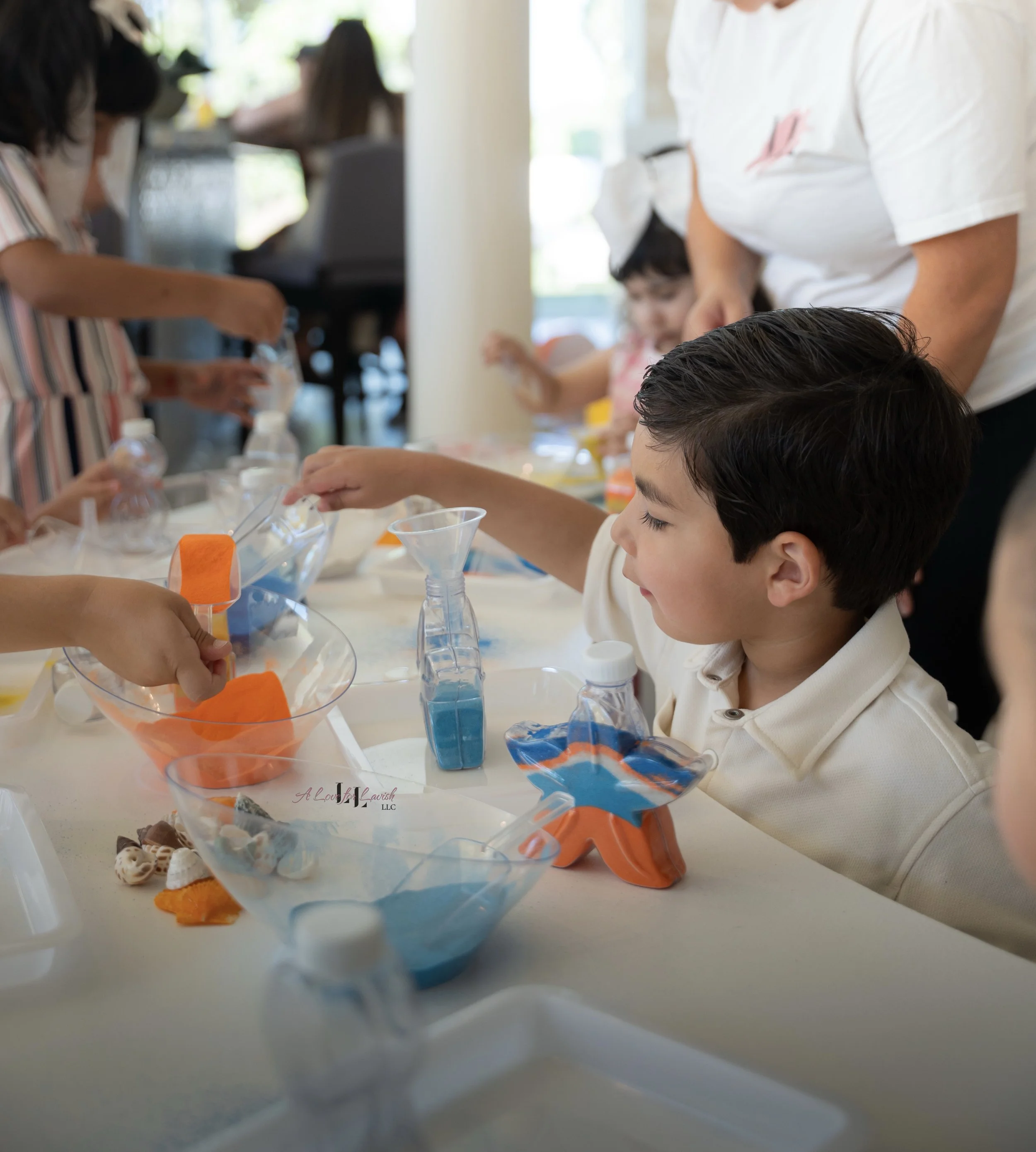 kids sand art station activity table sensory birthday party one in the sun summer theme beach colorful clay playdoh fun crafts art first birthday ideas 1st creative play activities hands on