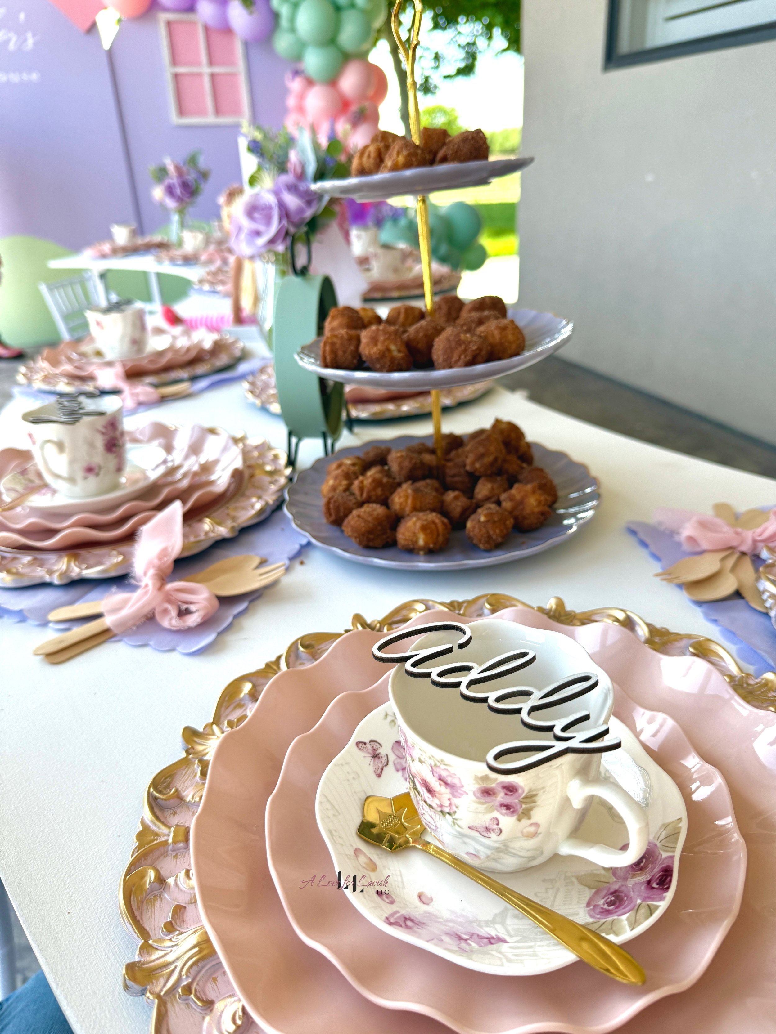 Tea party dollhouse teatime pastel backdrop balloons pink purple mint green tablescape custom place cards dolls doll party birthday event planner fancy setup garland floral bay area central valley book