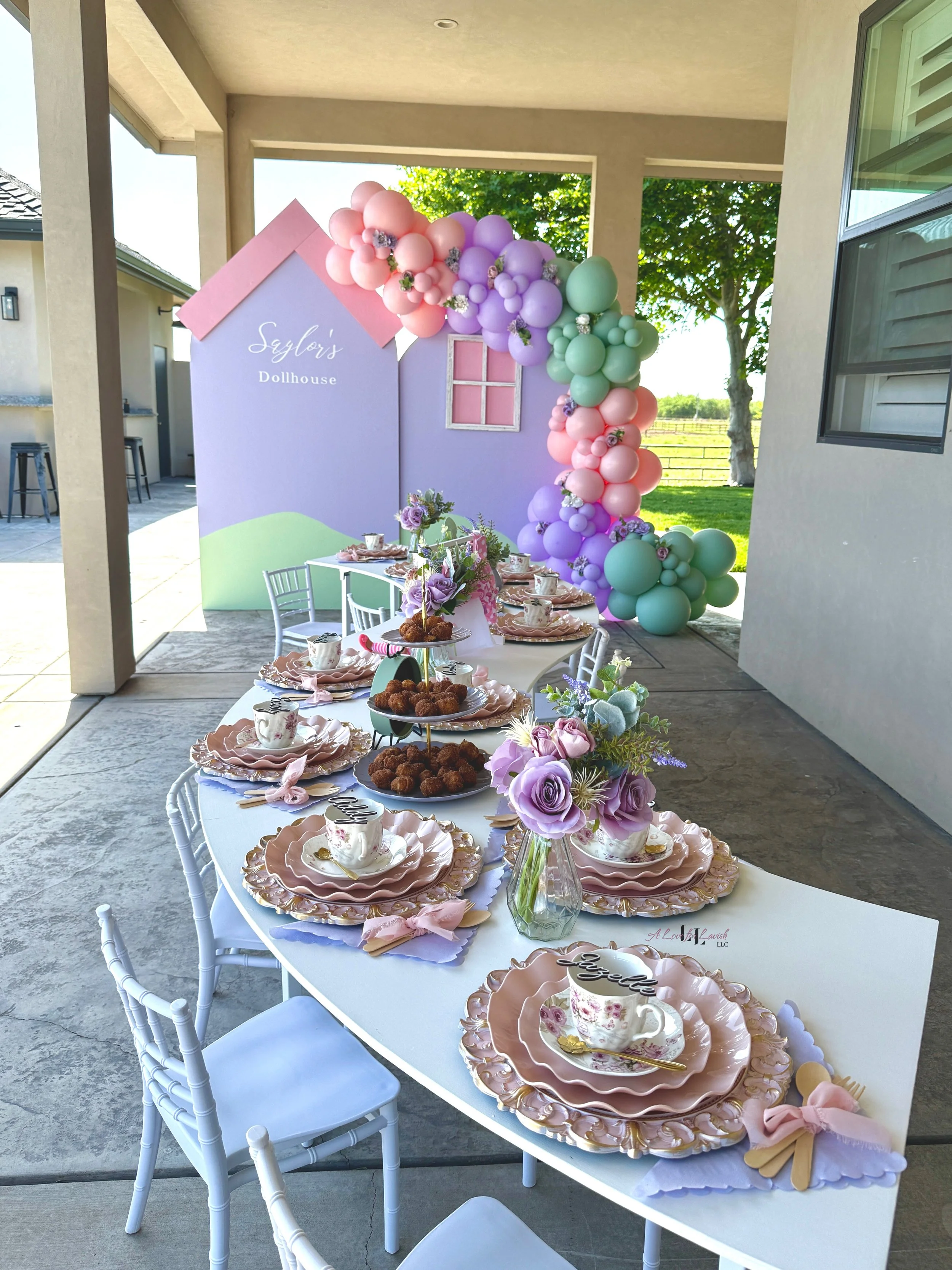 Tea party dollhouse teatime pastel backdrop balloons pink purple mint green tablescape custom place cards dolls doll party birthday event planner fancy setup garland floral bay area central valley book