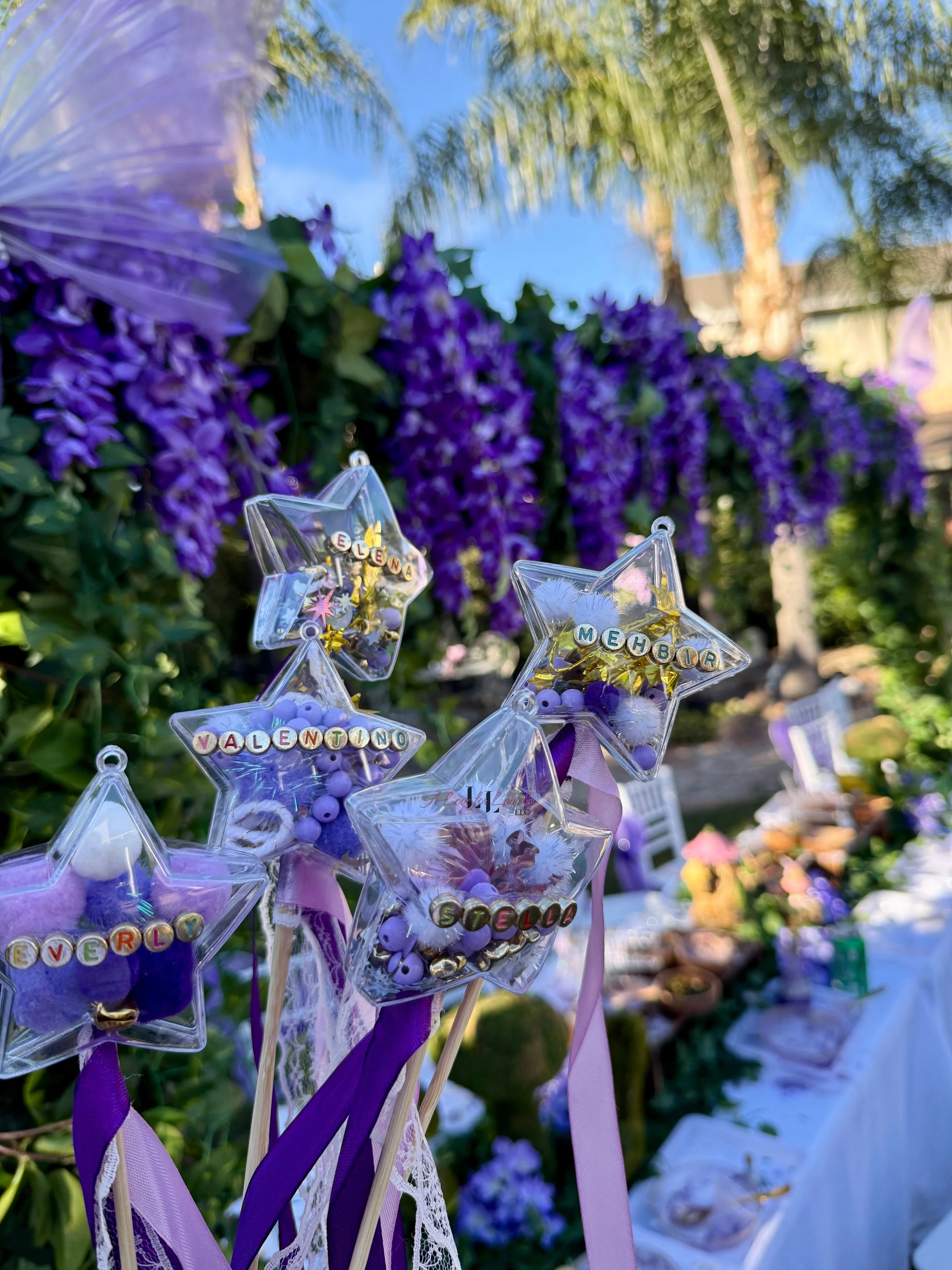 Fairy themed birthday party wands potions wand potion diy activity station kids party ideas activity tables table central valley bay area event planner stem science imagination creativity balloons balloon garland