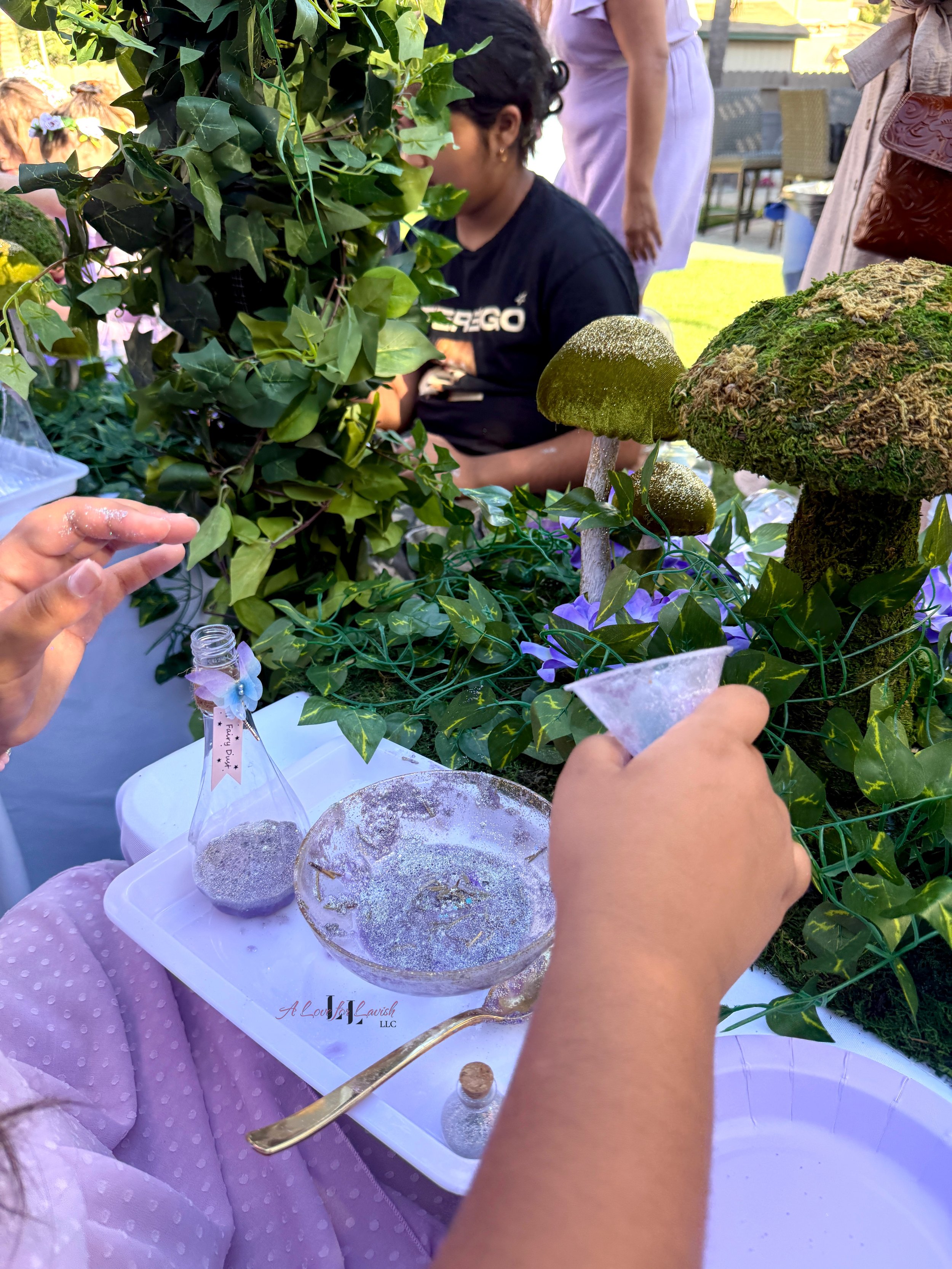 Fairy themed birthday party wands potions wand potion diy activity station kids party ideas activity tables table central valley bay area event planner stem science imagination creativity balloons balloon garland