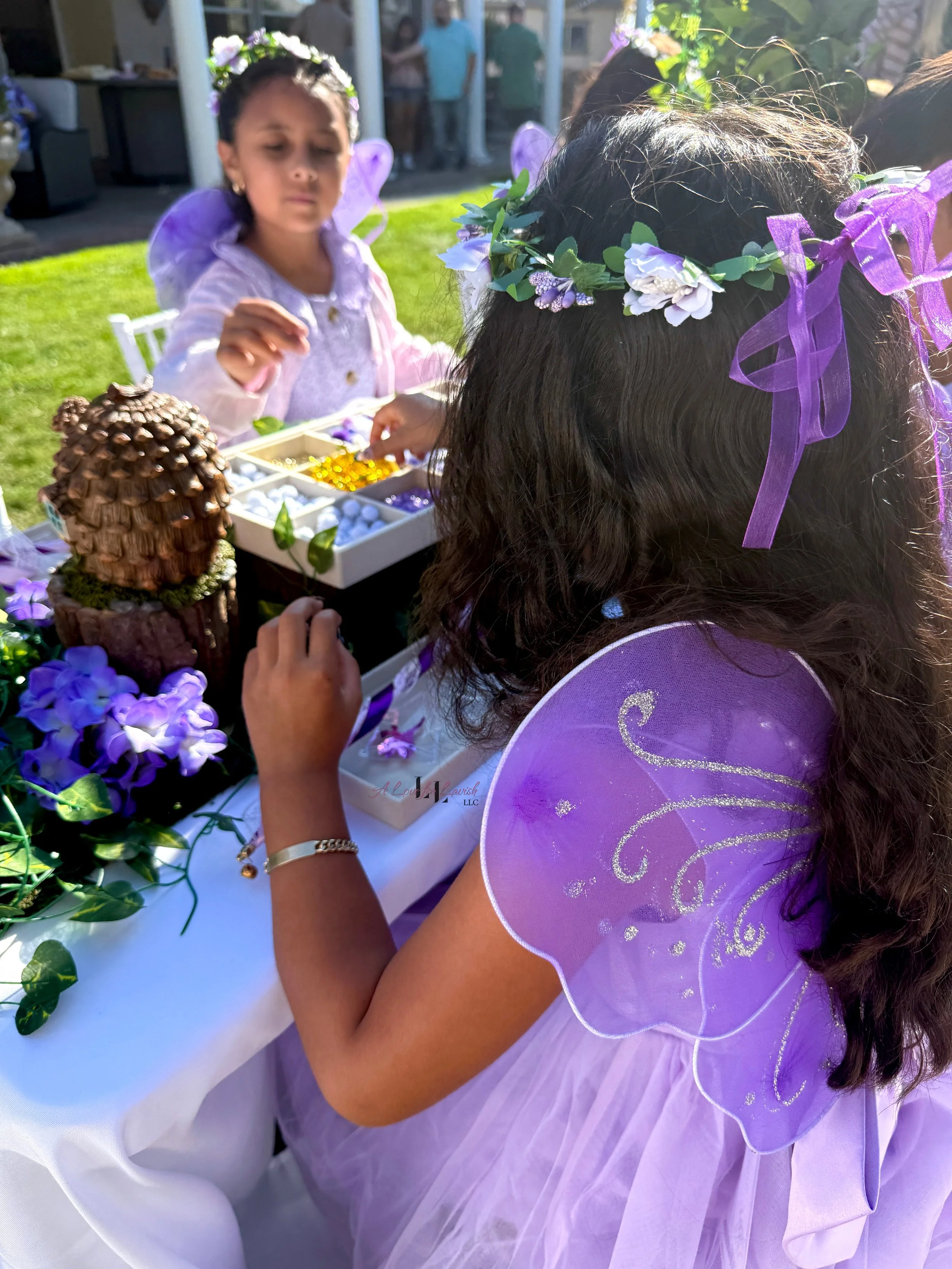 Fairy themed birthday party wands potions wand potion diy activity station kids party ideas activity tables table central valley bay area event planner stem science imagination creativity balloons balloon garland
