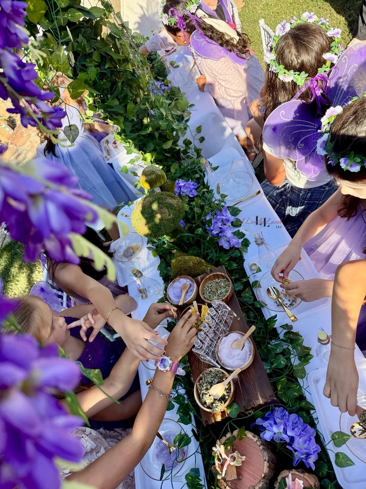 Fairy themed birthday party wands potions wand potion diy activity station kids party ideas activity tables table central valley bay area event planner stem science imagination creativity balloons balloon garland