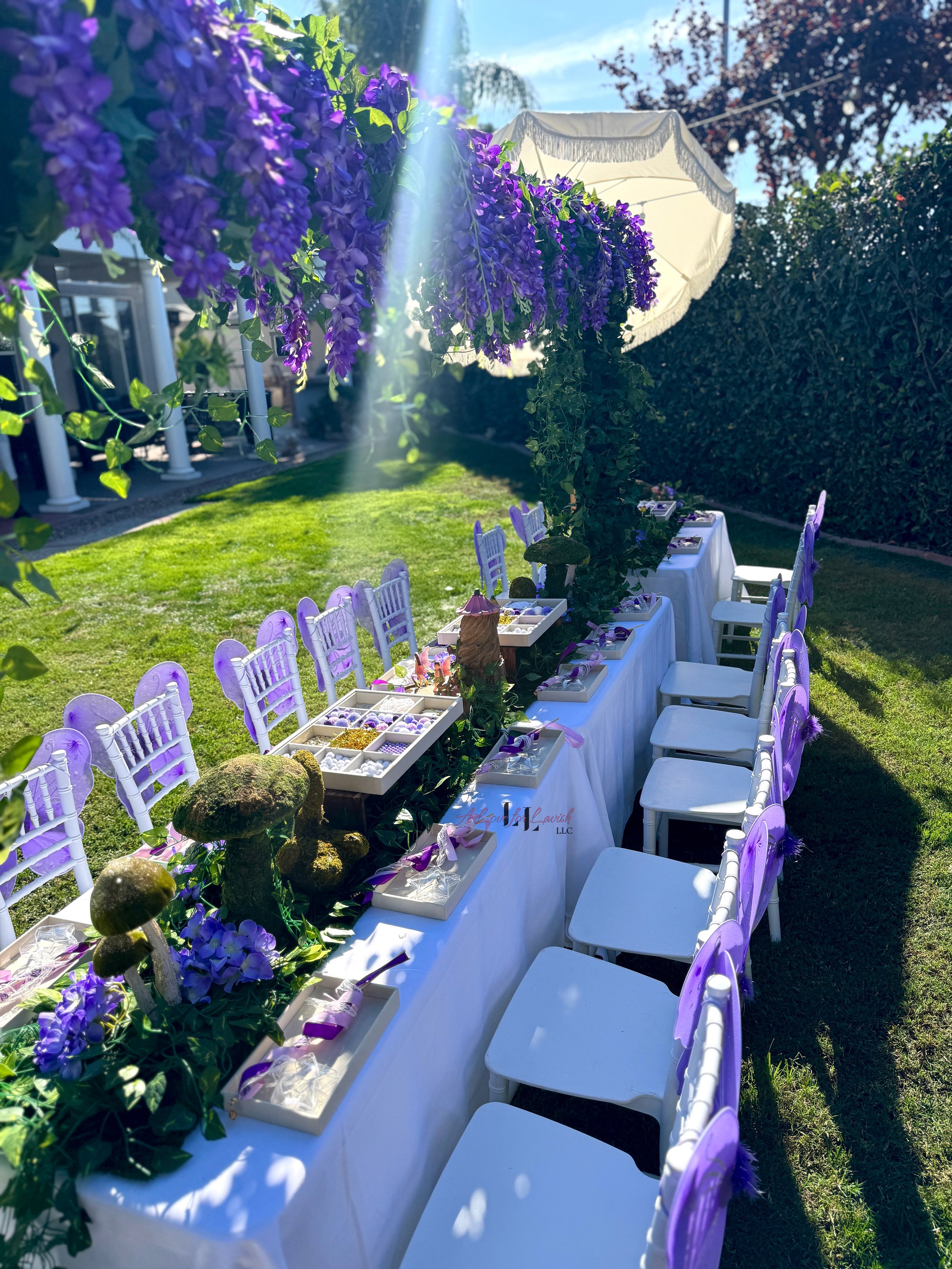 Fairy themed birthday party wands potions wand potion diy activity station kids party ideas activity tables table central valley bay area event planner stem science imagination creativity balloons balloon garland