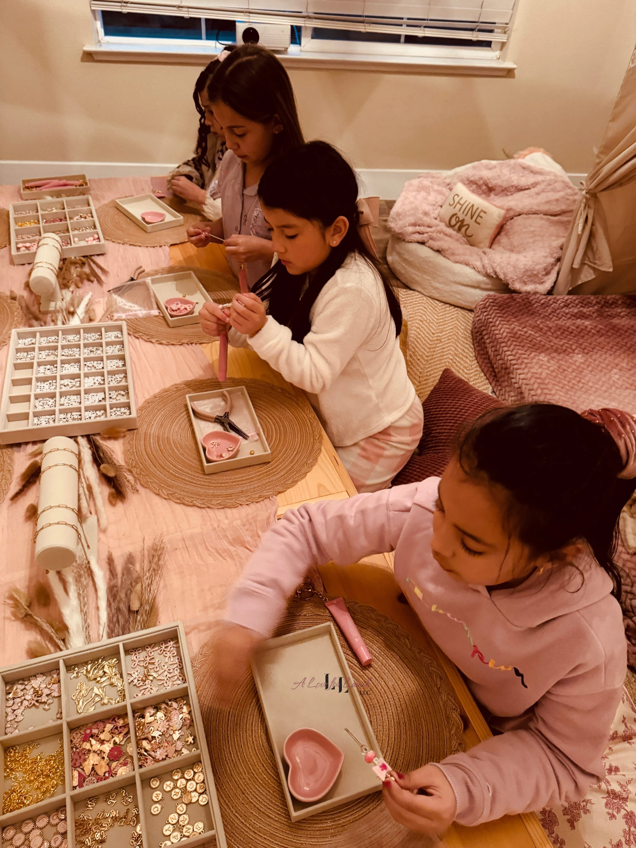 Kids craft activity table ideas birthday party girl girlhood charms lip gloss keychain keychains colourpop best friends preteen teen teens custom paper clip chain beads bay area central valley 