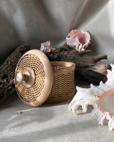 Small 4" Nantucket hat box basket.  This beautiful basket  was created using premium oak hardwood base, rims and Cherry hardwood staves.  The know is solid oak with Ivory inlay top.  This will be an heirloom piece that will patina over time.
