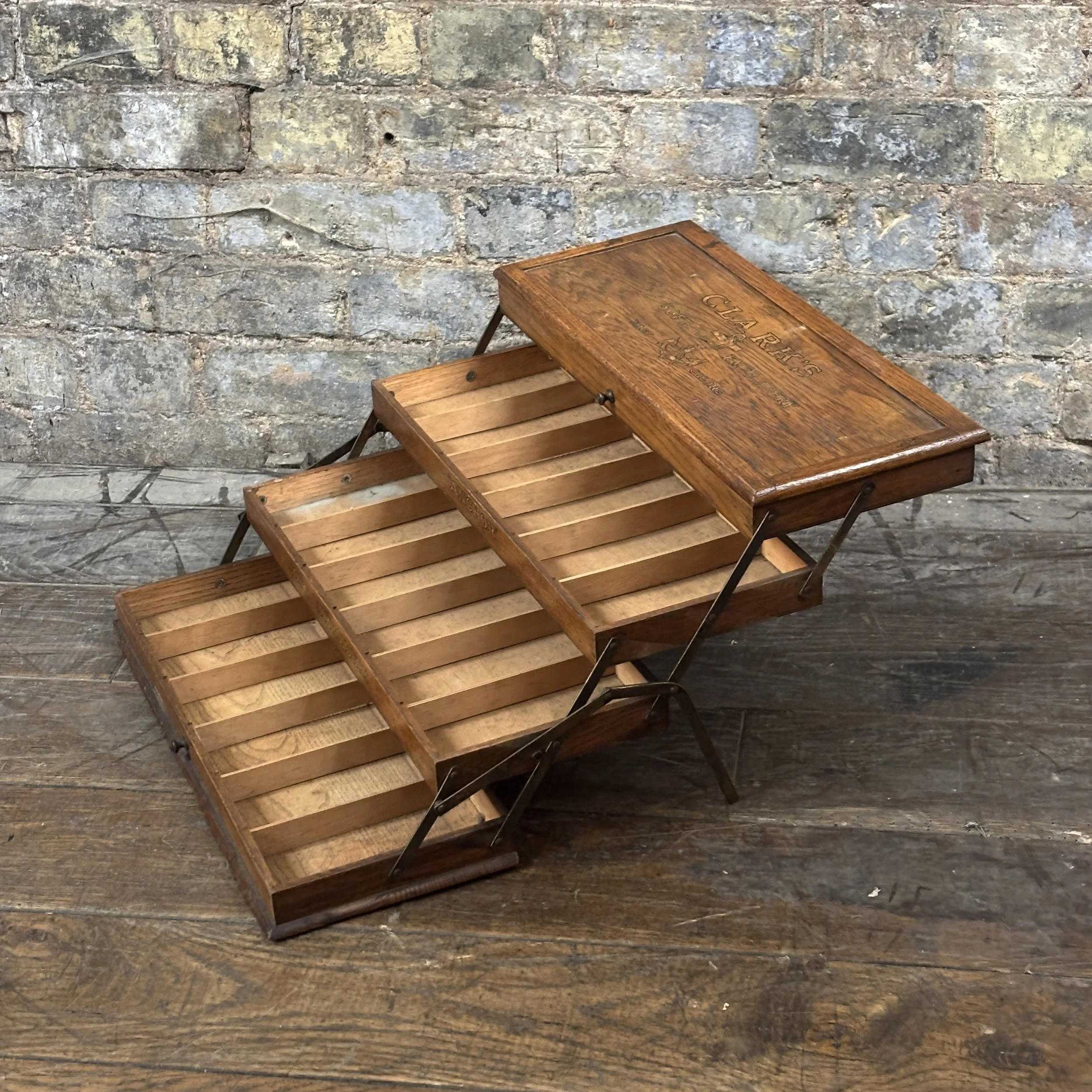 Clark’s “Anchor”  Folding Display Cabinet