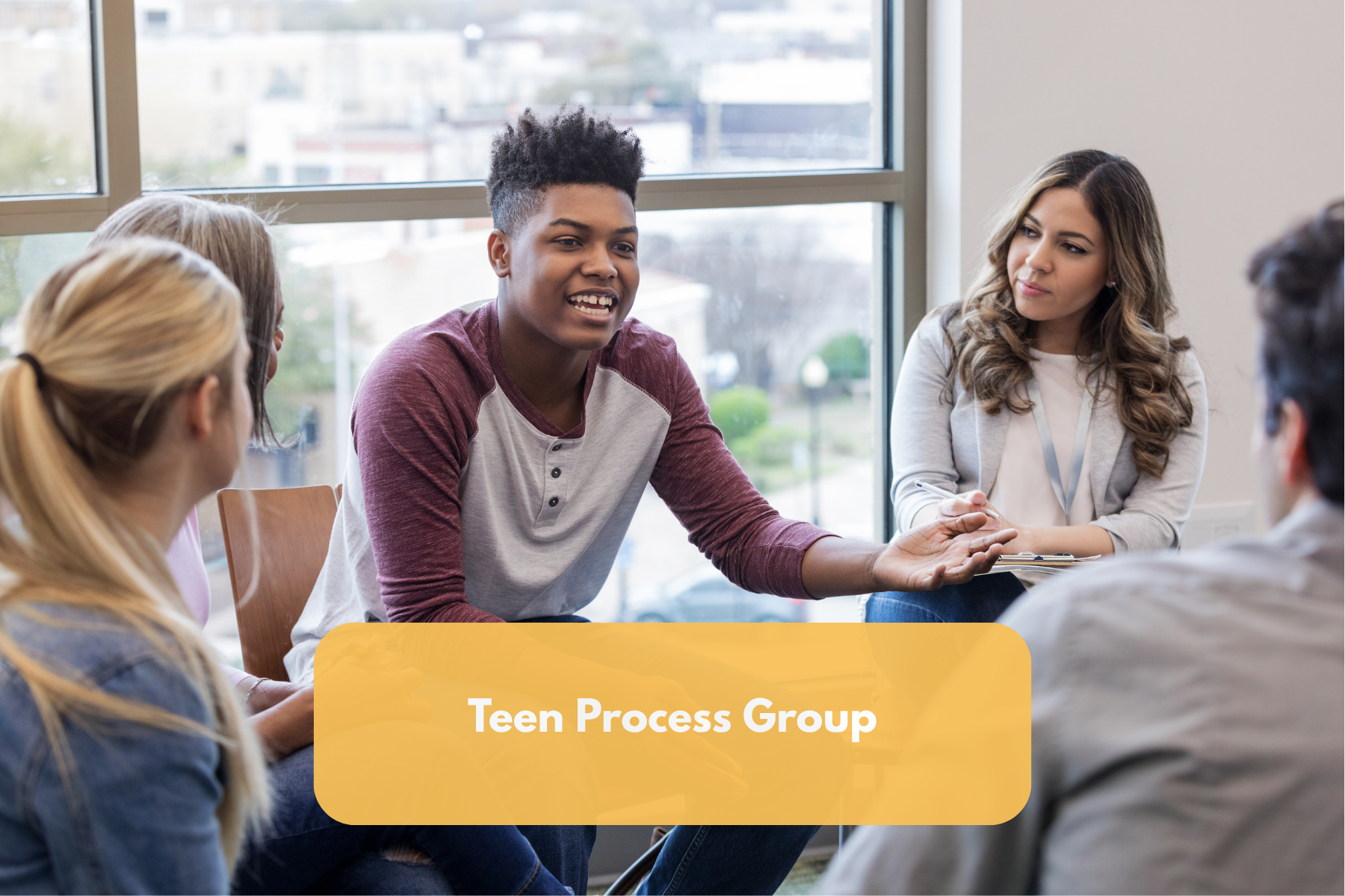 Teens in a group circle talking