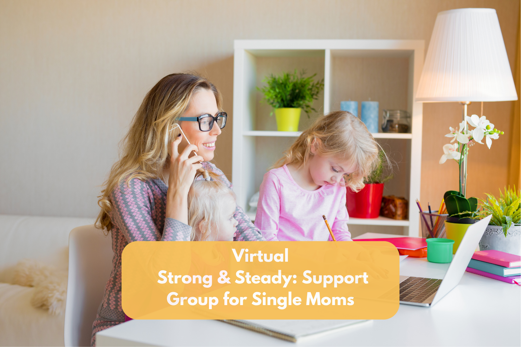Busy mom on the phone and computer with two kids
