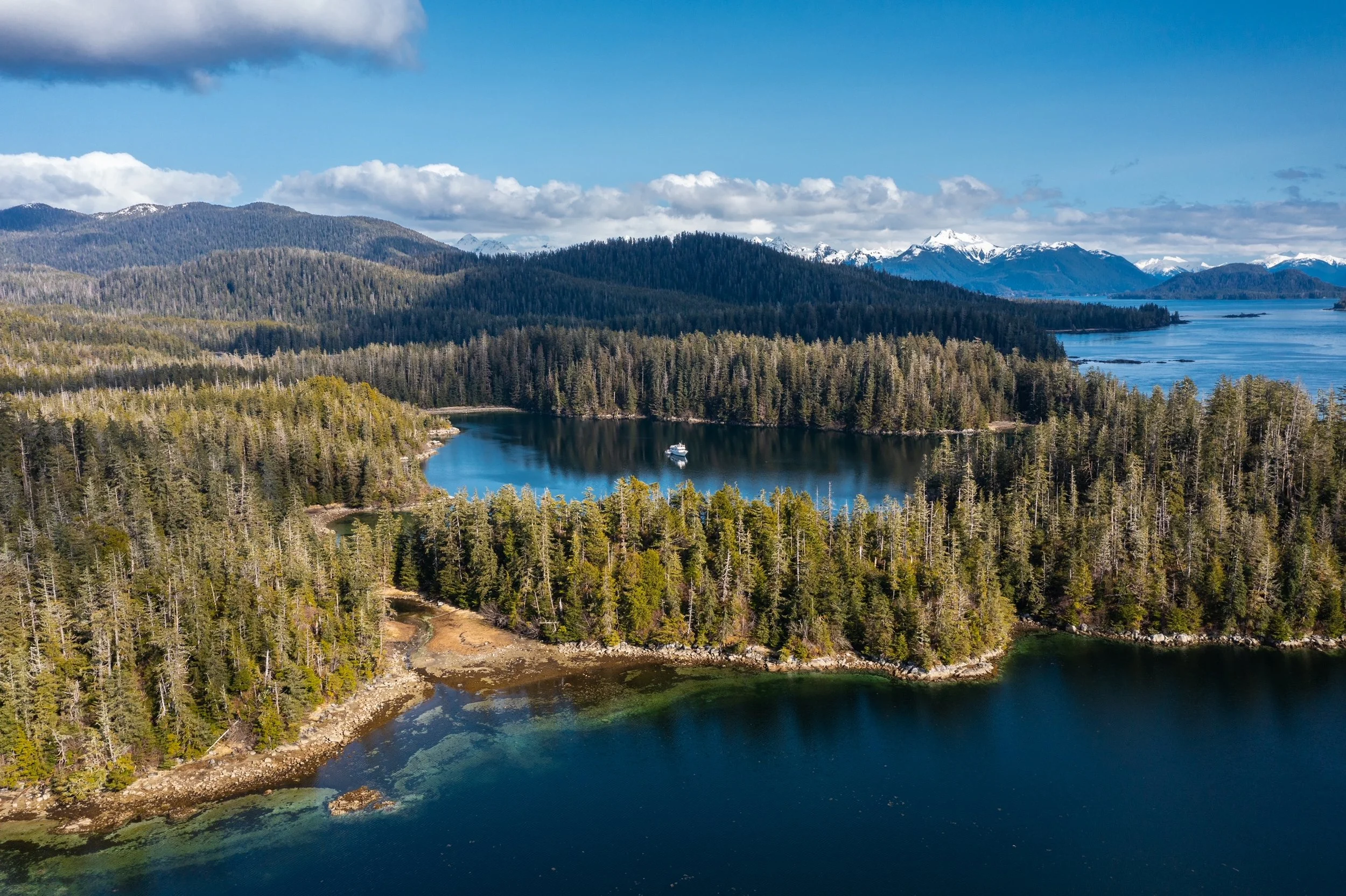 Aerial view of Silver Lady anchored in a cove.