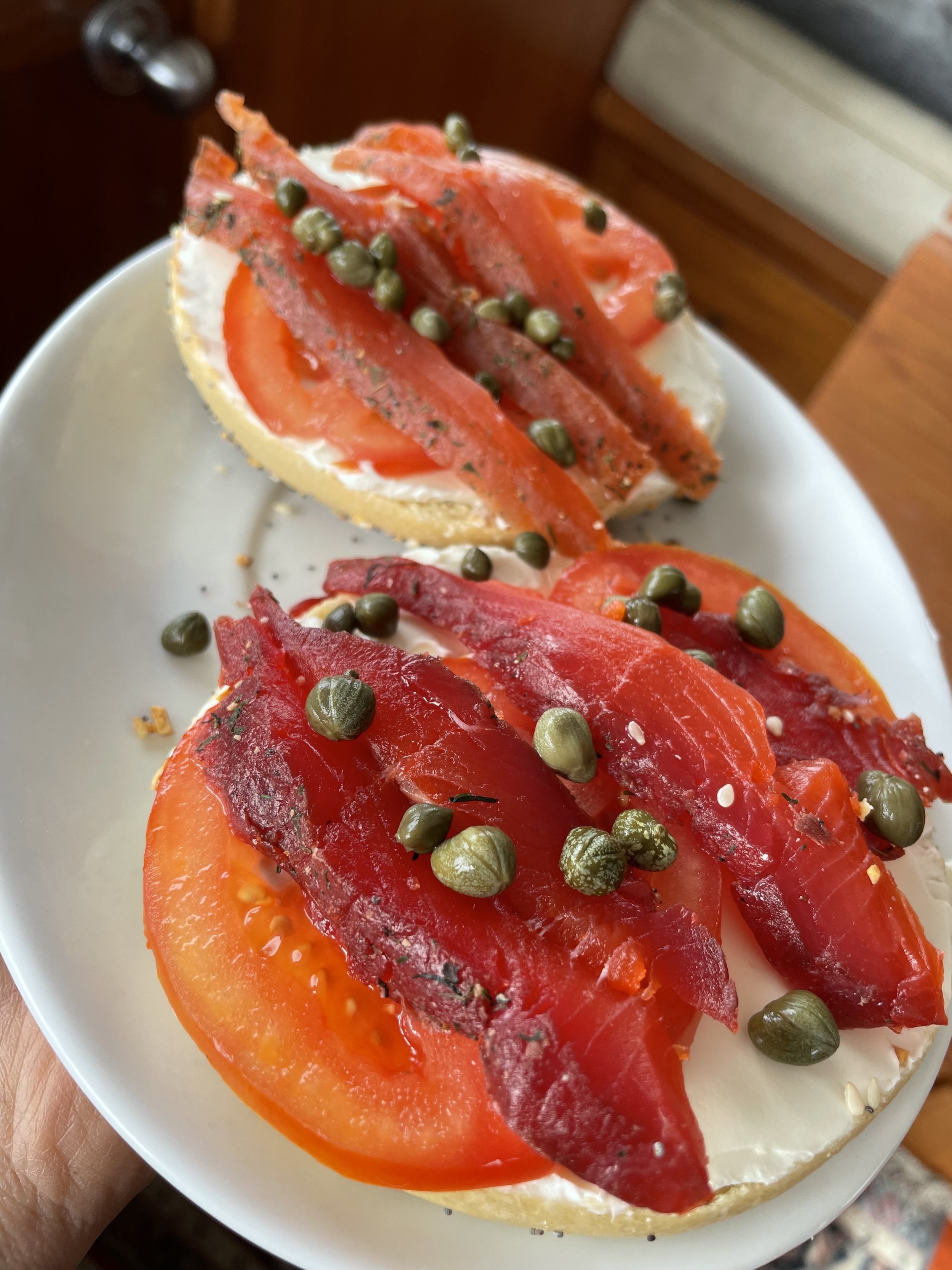 Alaskan lox on bagels topped with capers.