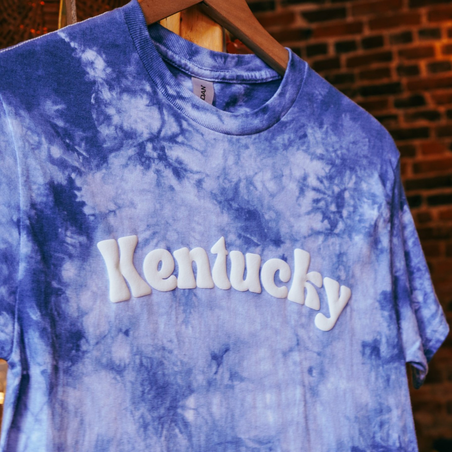 Gear up for some Kentucky lovin' with these tees from @embracedchaosdesigns! 🌟 Whether you're a die-hard fan or just lovin' the bluegrass vibes, we've got your wardrobe covered. Grab yours today and rep the best of the Bluegrass State! 💙🐎 

#theam
