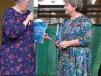 Cheryl Griffin author of The Old Boys of Coburg State School go to War presenting Margaret with her wonderful book