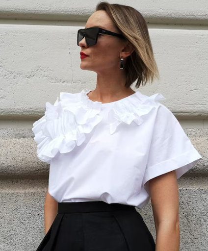 A classic with a twist: this simple white t-shirt finished with beautiful ruffles will dress up any outfit.  I love a versatile piece of clothing and this certainly ticks all the boxes: I would wear this with jeans and trainers or flats for a pared b
