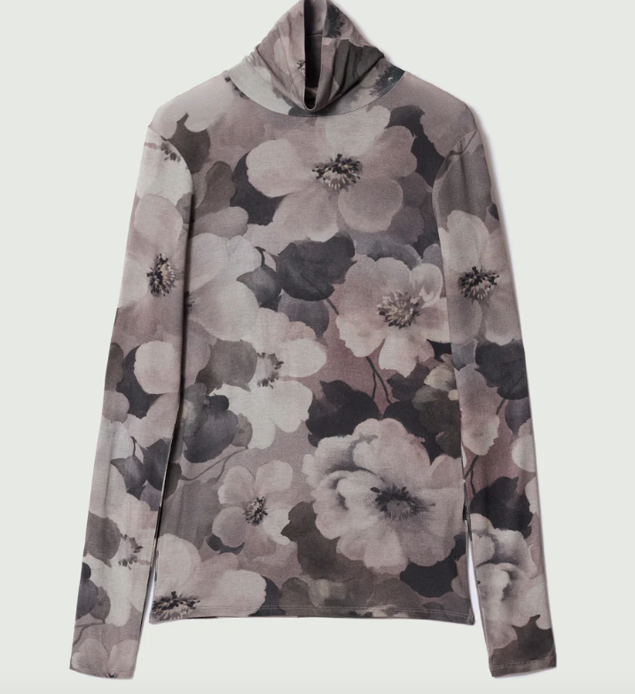 This faded floral high neck top is a gorgeous combination of wow but also under-stated elegance.  Wear with tailored trousers for a sleek look, or par down with black or grey jeans and trainers for a cooler vibe.  Would also look great layered under 