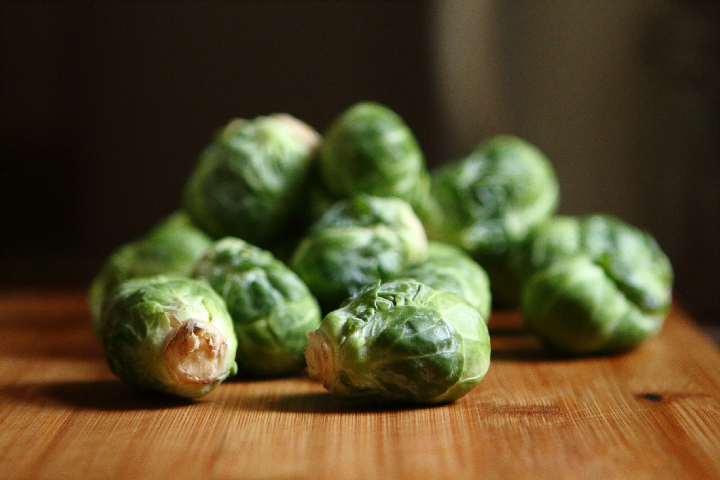 A picture of sprouts with an article about gut health and the link with PCOS