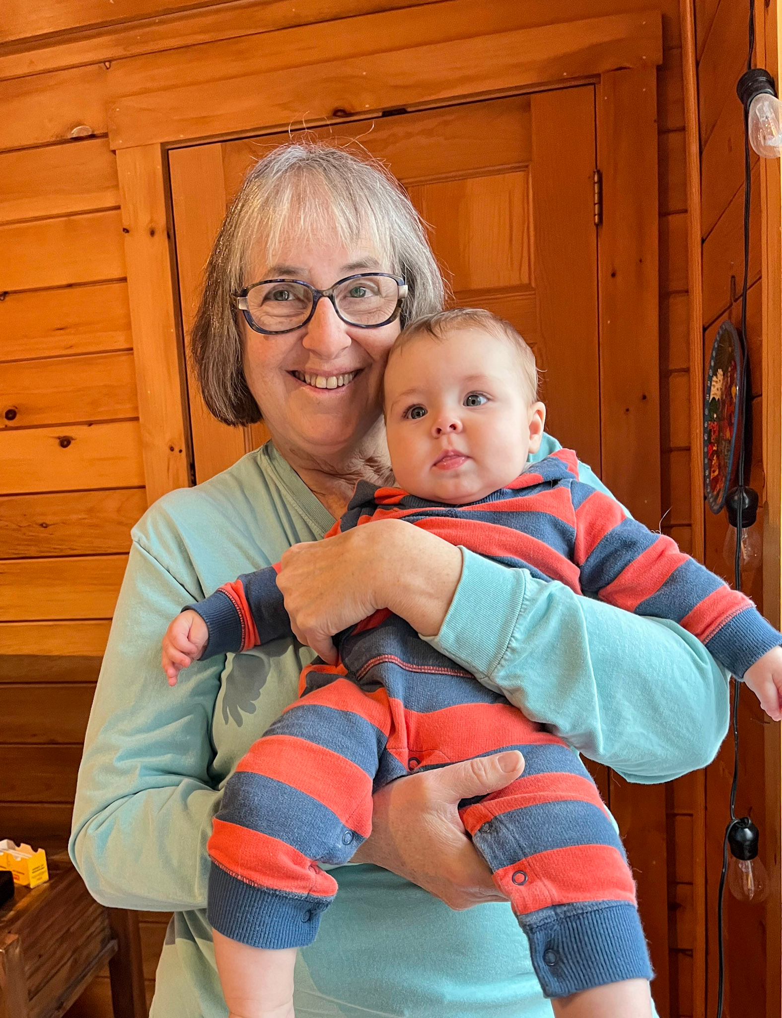 Barb Acosta ’77 with her grandchild