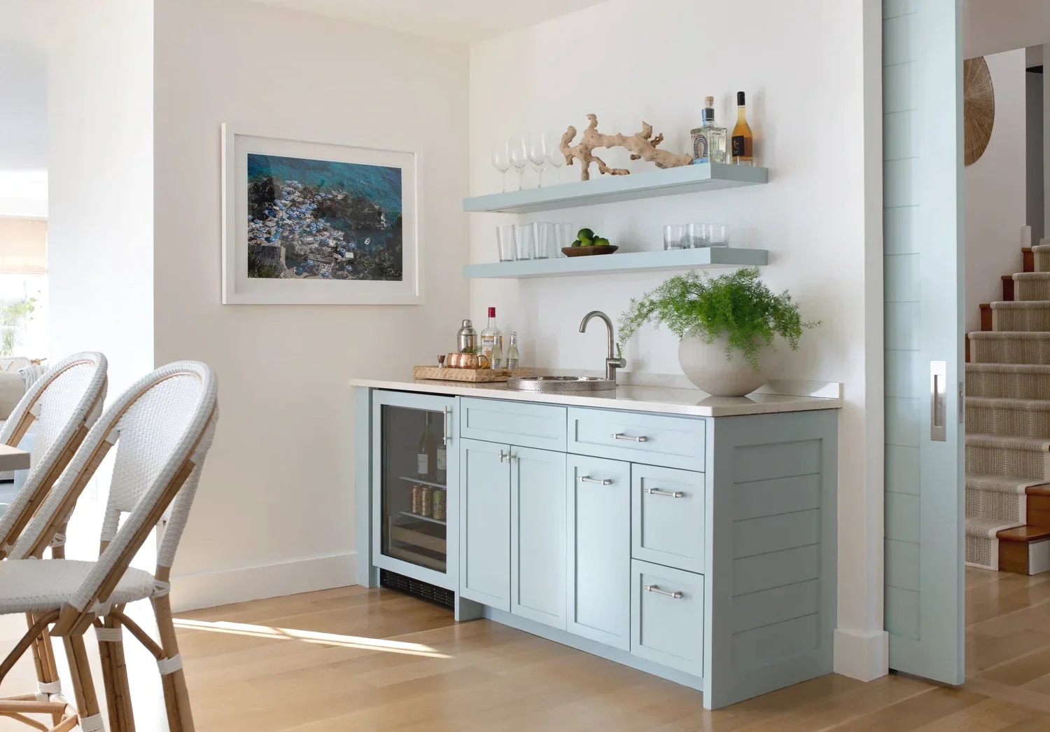 Coastal kitchen with custom bar area in a North Shore Massachusetts home designed by Justine Sterling Design.