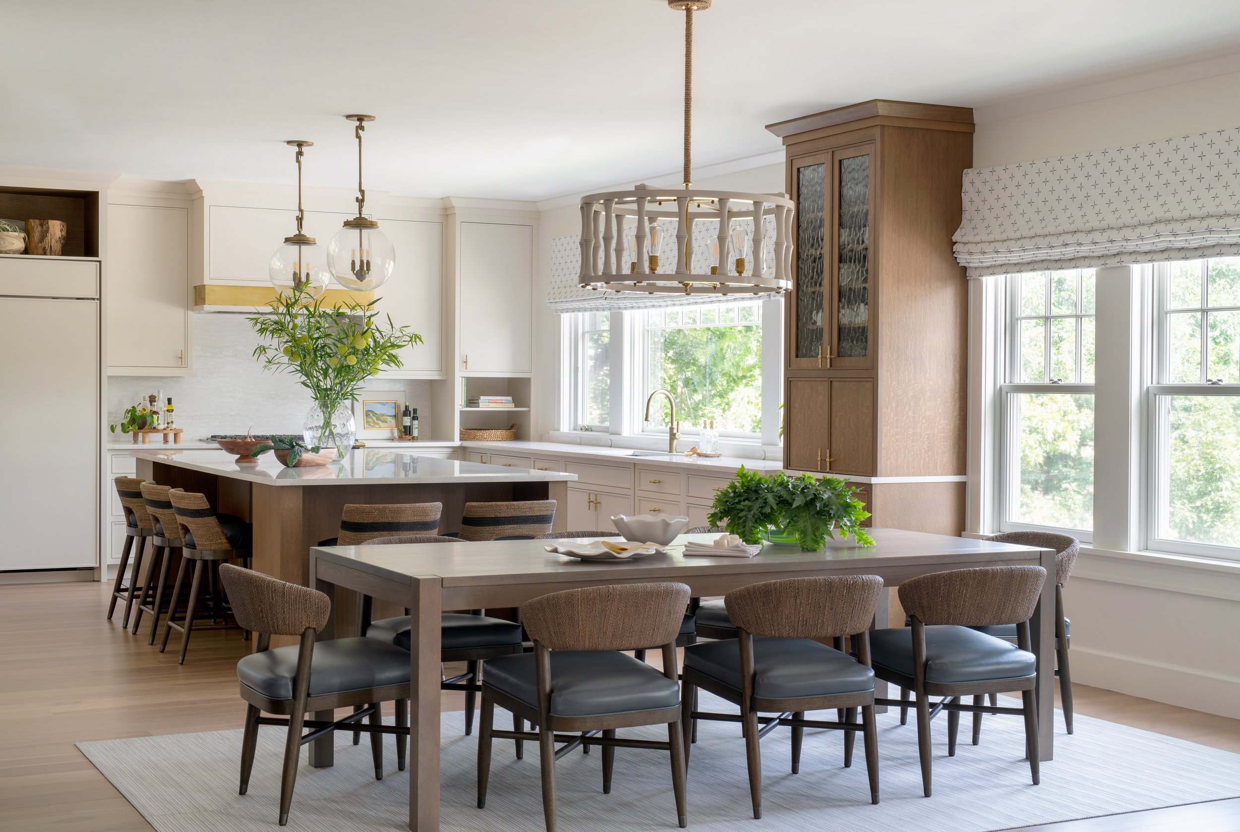 Coastal dining room and kitchen with wood accents.