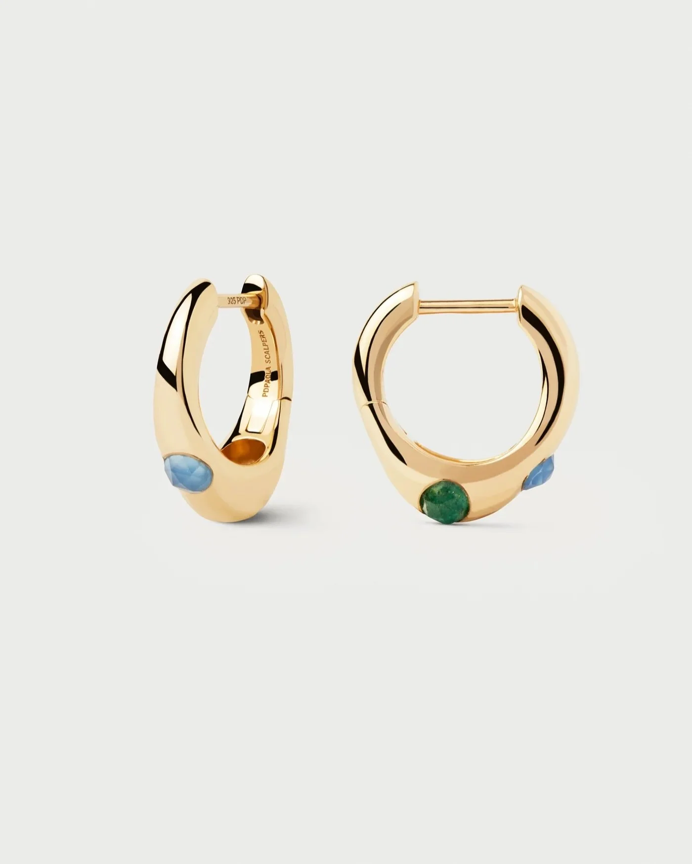 Featuring organic silhouettes, PDPAOLA's Coral Hoop Earrings combine textured finish with green aventurine and blue chalcedony quartz. 

Discover our curated collection of jewellery in-store and online, including a range of bracelets, earrings, and n
