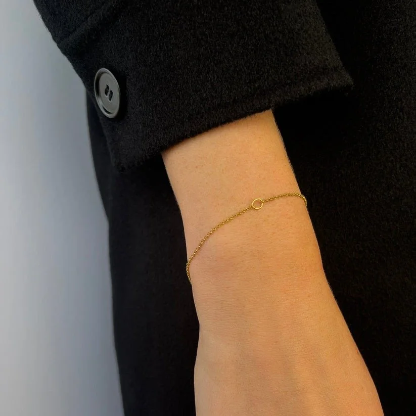 CircleBraceletArmGold.jpeg