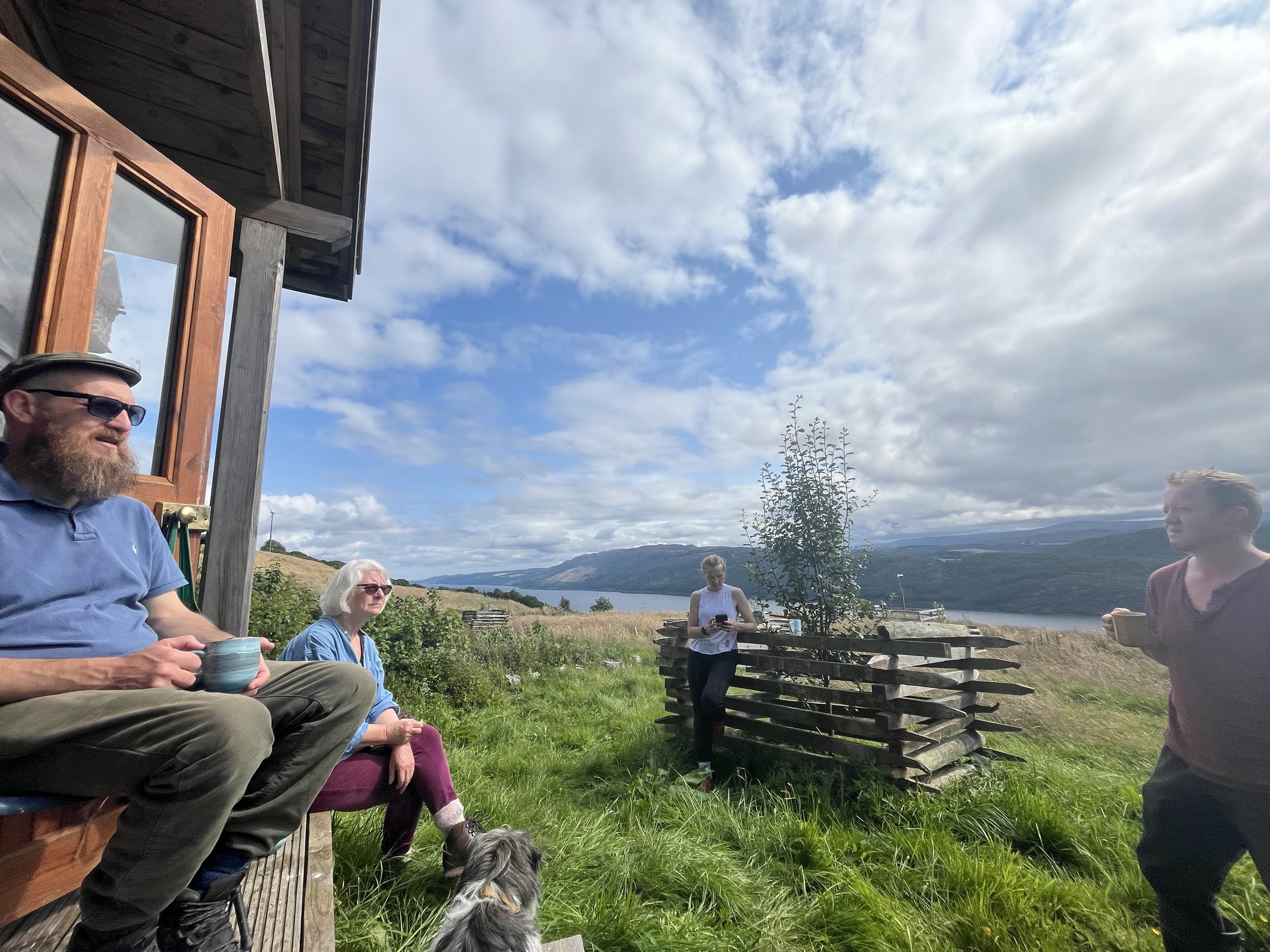 29 Volunteer Nature Days tea break at hut summer 2024.jpeg